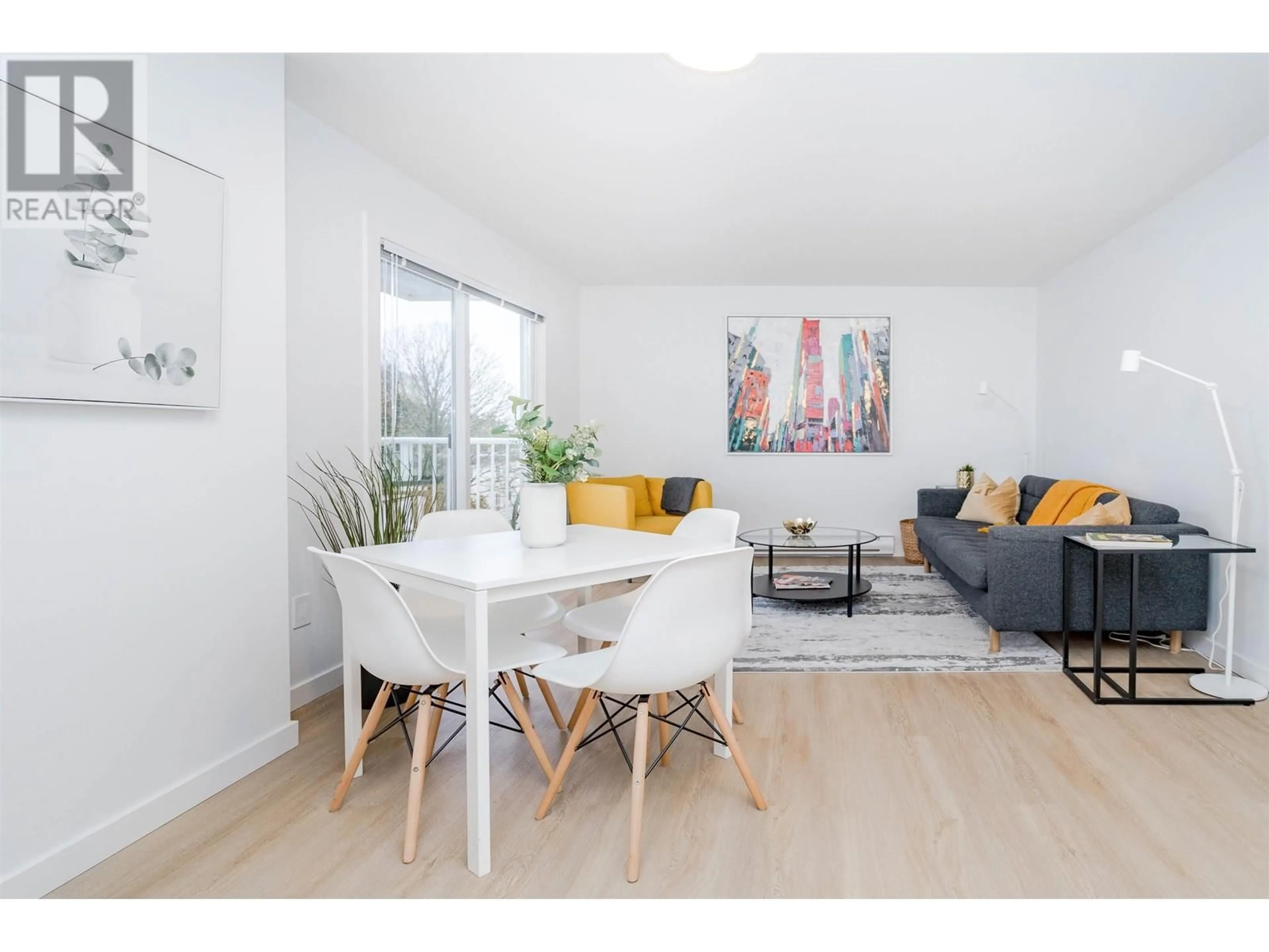 Living room with furniture, wood/laminate floor for 303 - 8690 MONTCALM STREET, Vancouver British Columbia V6P4P8