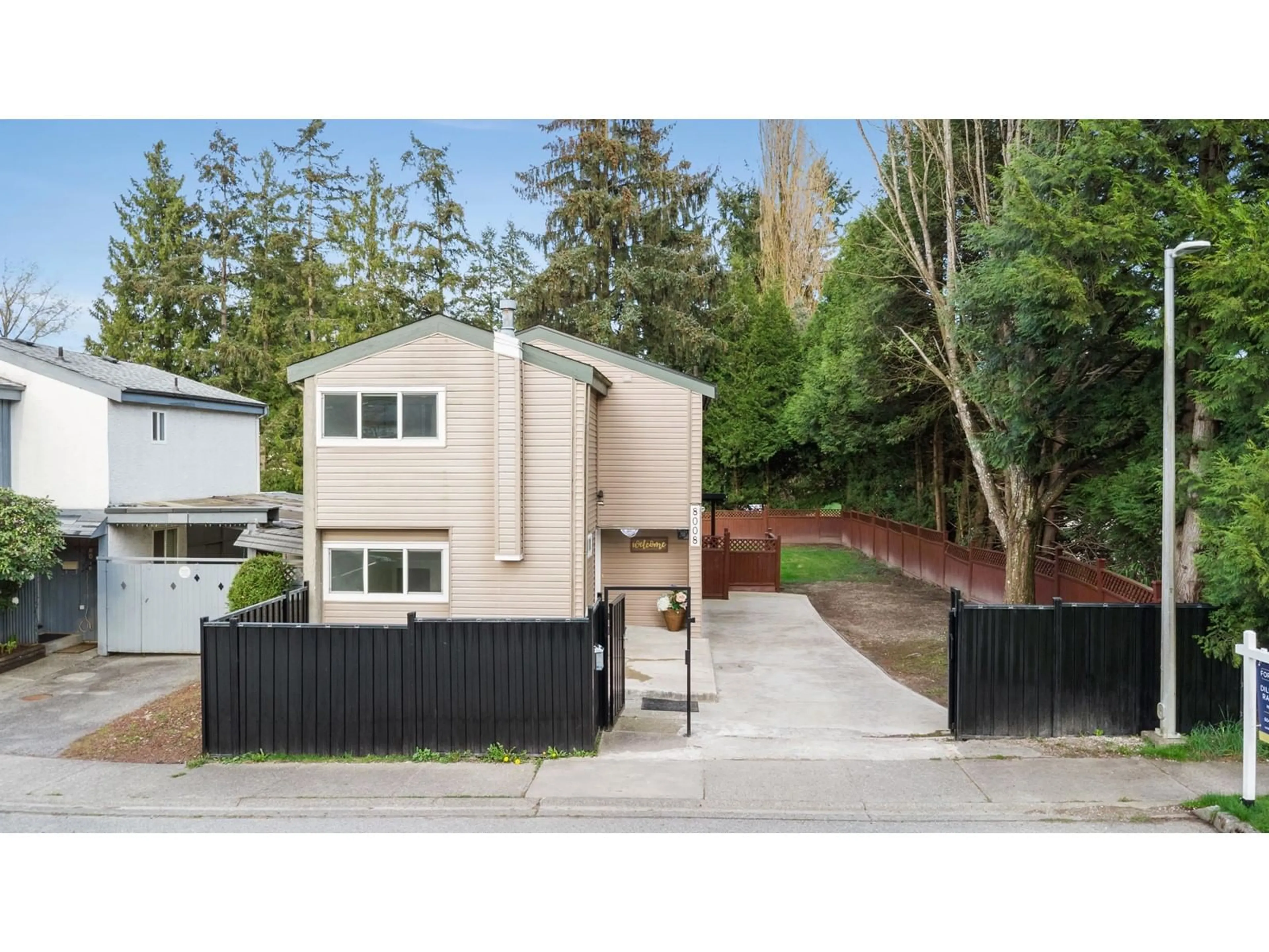 A pic from outside/outdoor area/front of a property/back of a property/a pic from drone, street for 8008 139B, Surrey British Columbia V3W6R3