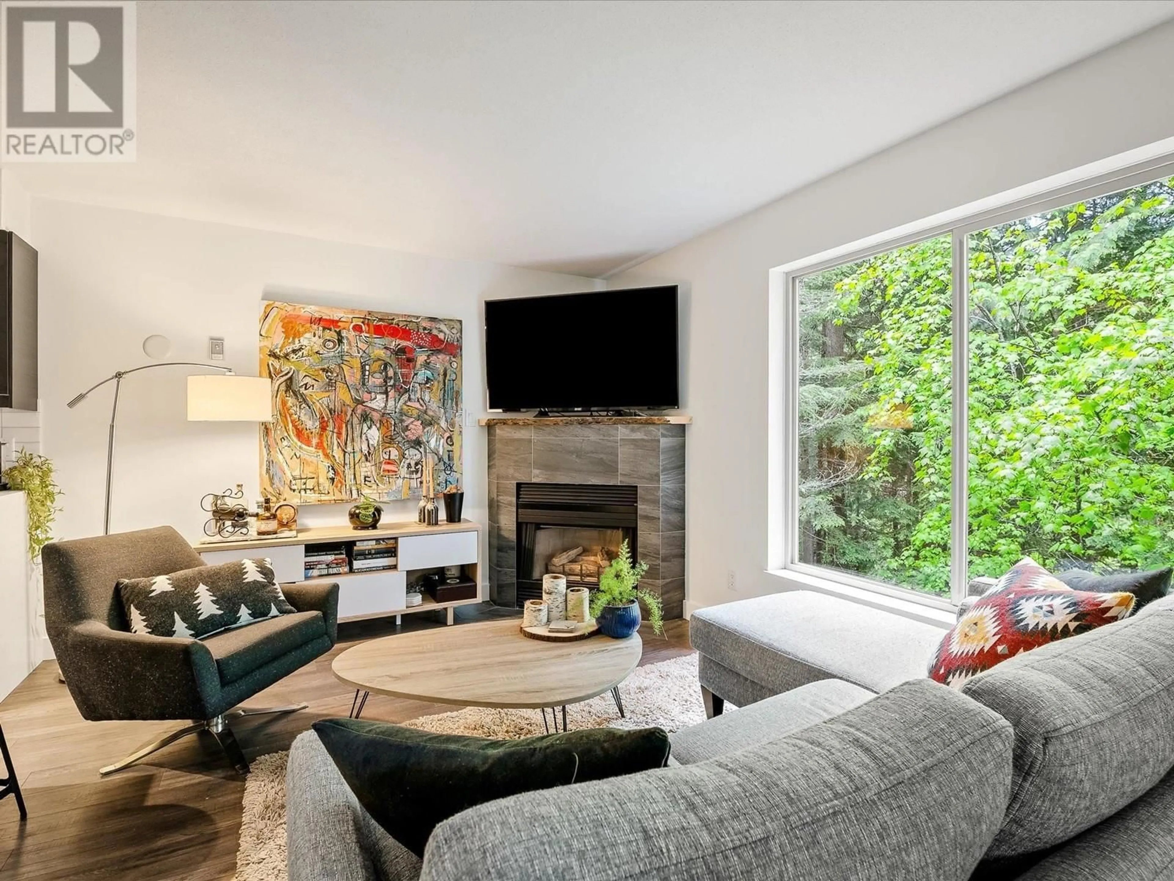 Living room with furniture, unknown for 111 - 3070 HILLCREST DRIVE, Whistler British Columbia V8E0V1