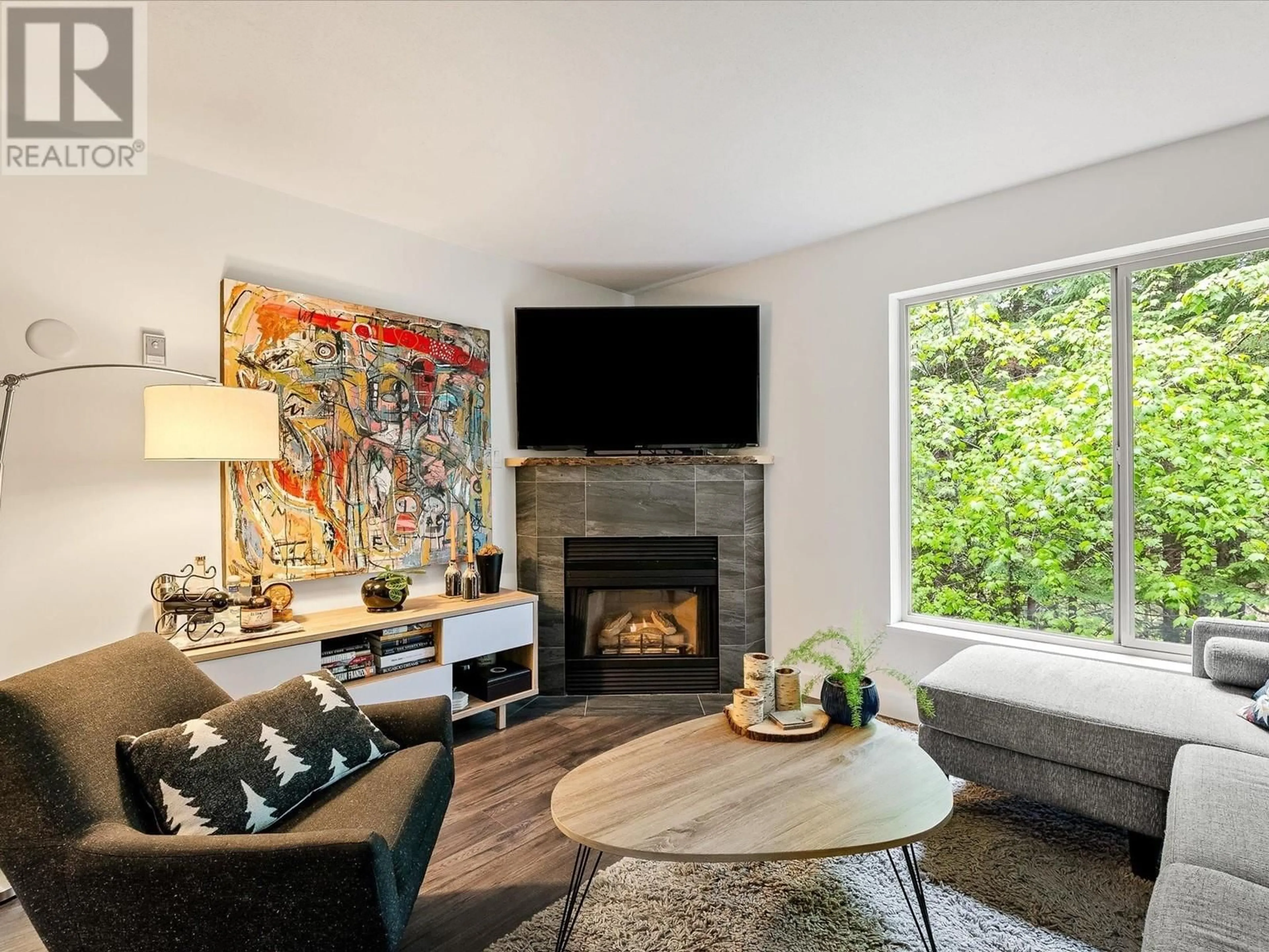 Living room with furniture, unknown for 111 - 3070 HILLCREST DRIVE, Whistler British Columbia V8E0V1