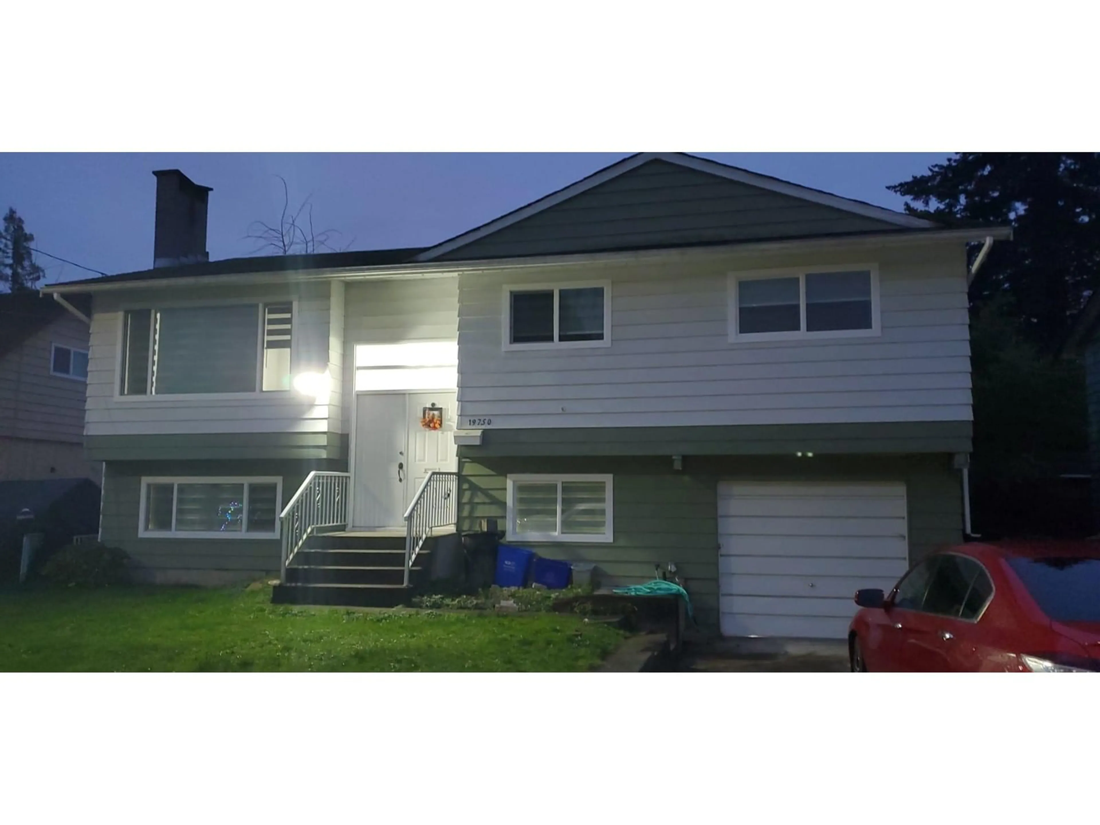 Home with vinyl exterior material, street for 19750 54A, Langley British Columbia V3A3W5