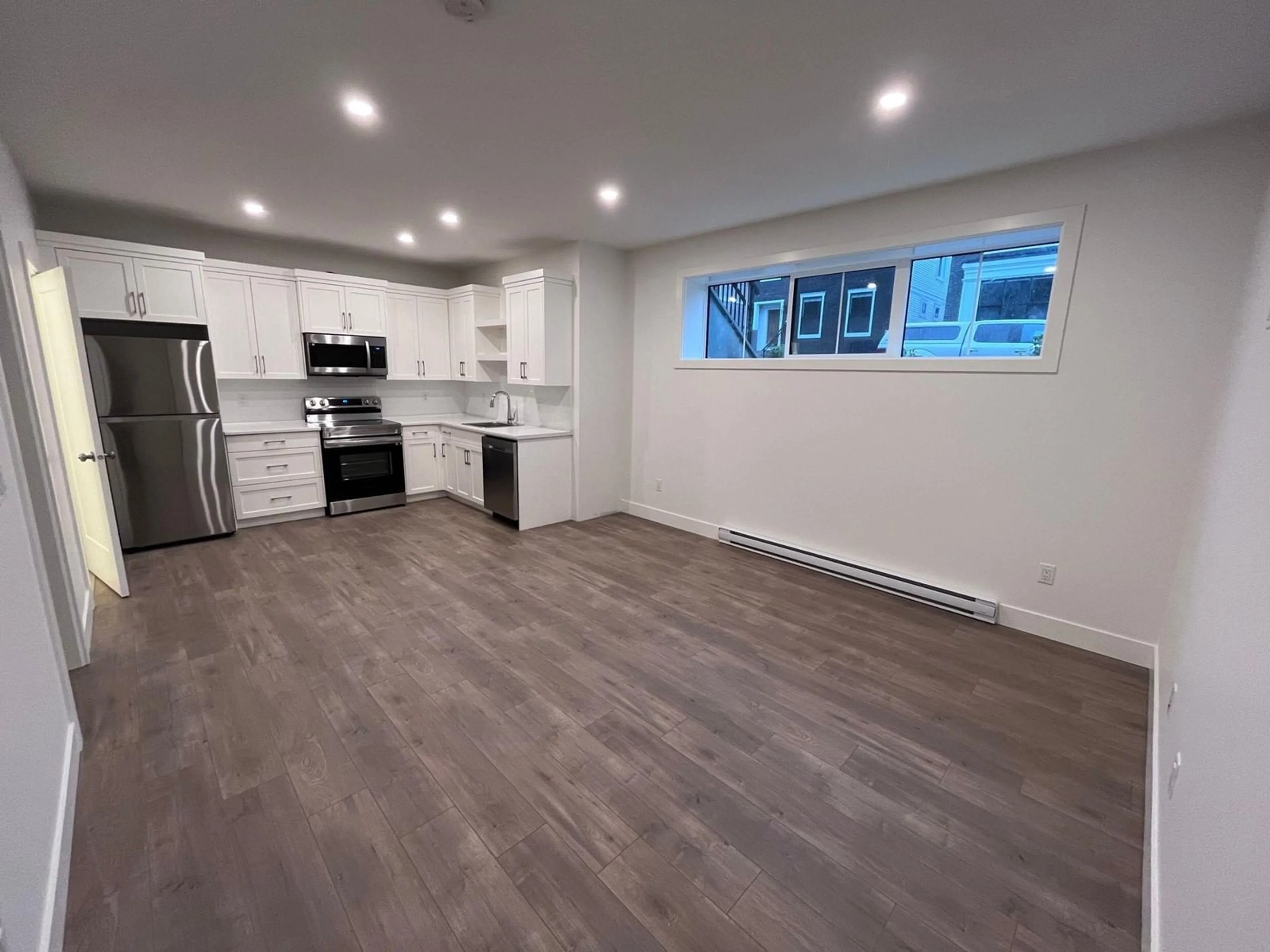 Open concept kitchen, wood/laminate floor for 7873 CEDARBROOK ROAD, Chilliwack British Columbia V2R6G7