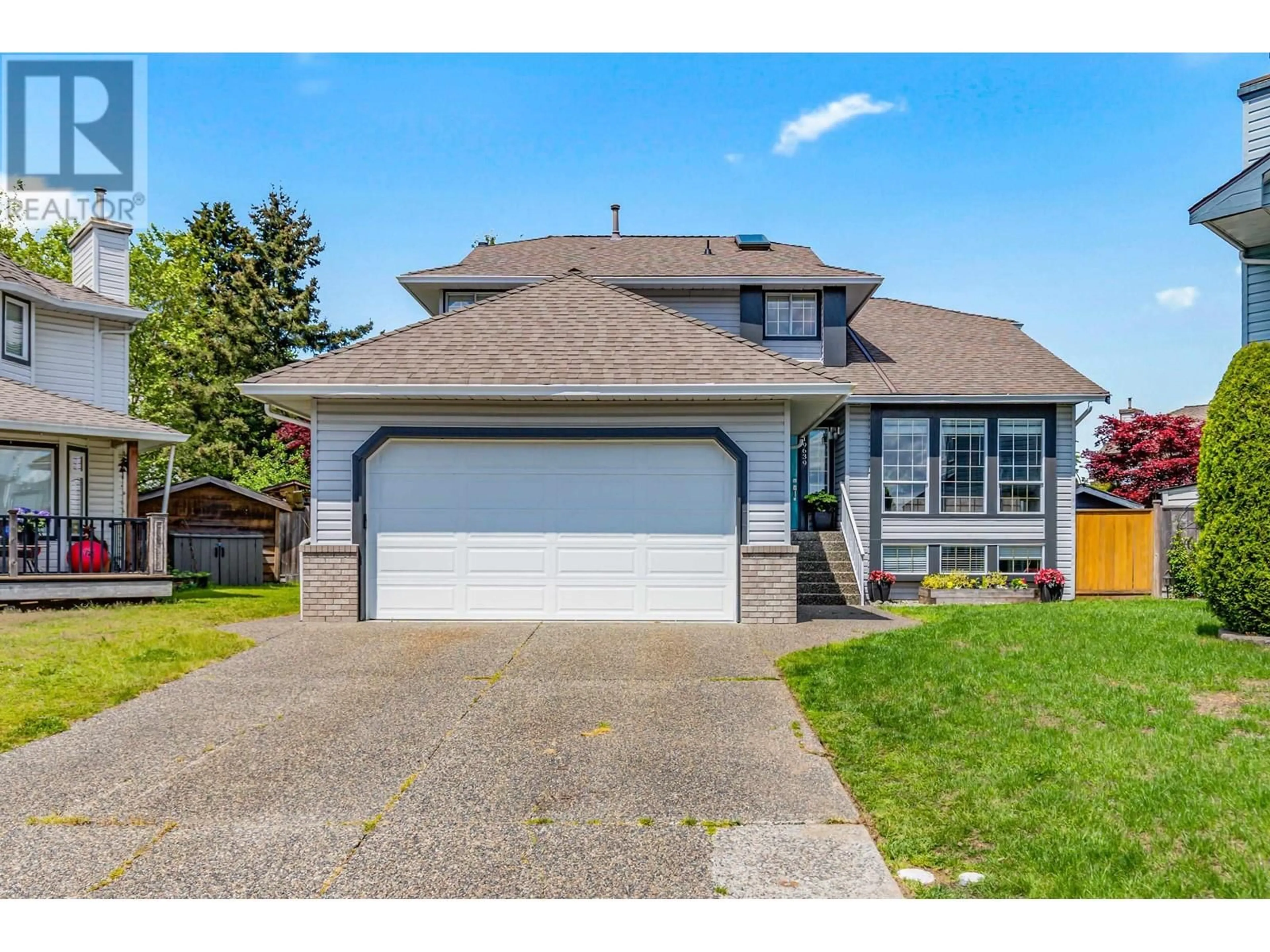 Home with vinyl exterior material, street for 19639 CEDAR LANE, Pitt Meadows British Columbia V3Y2E3