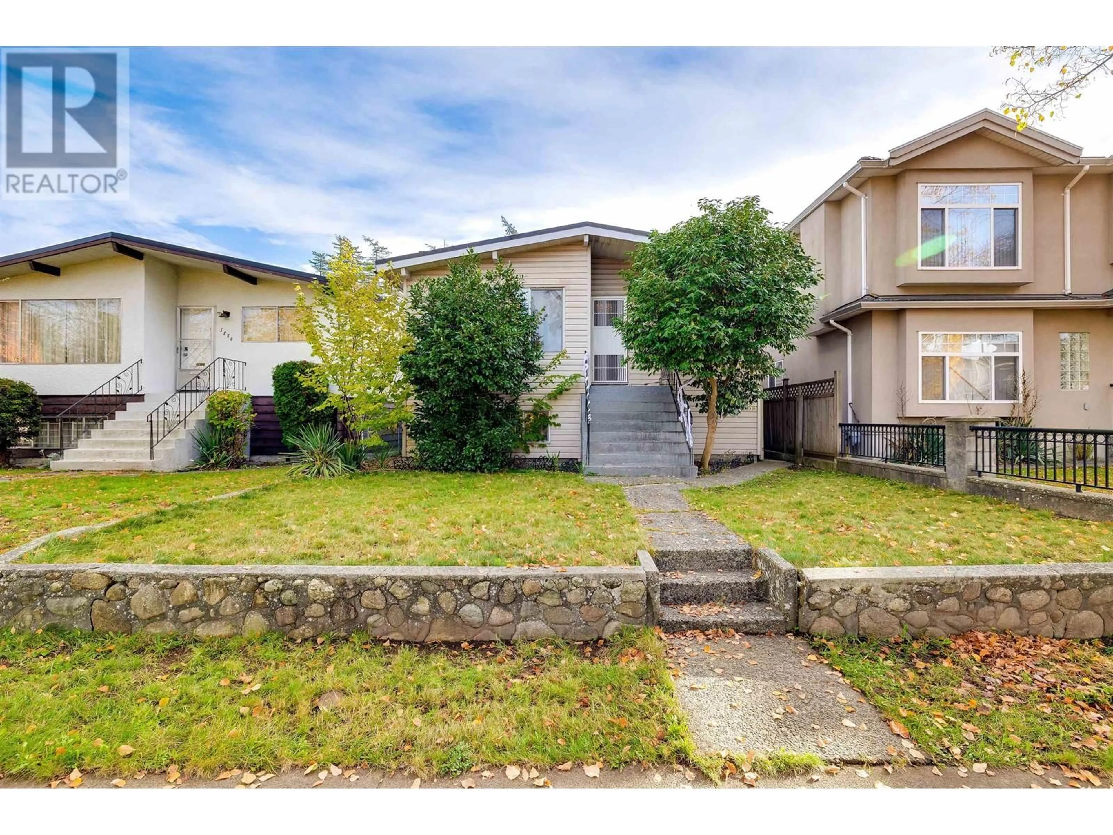 A pic from outside/outdoor area/front of a property/back of a property/a pic from drone, street for 5888 ORMIDALE STREET, Vancouver British Columbia V5R4R3