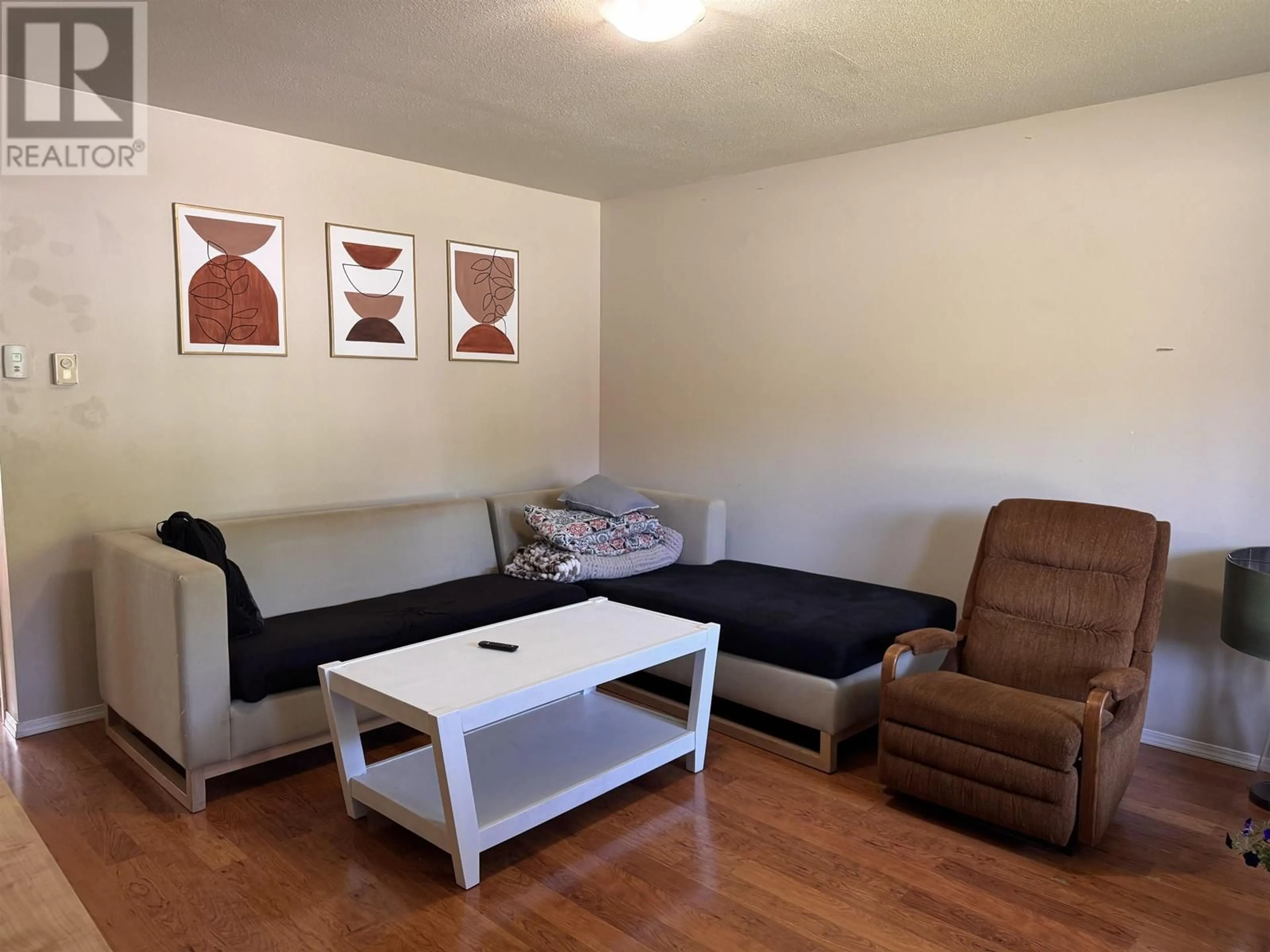 Living room with furniture, wood/laminate floor for B - 3421 KALUM STREET, Terrace British Columbia V8G2N8