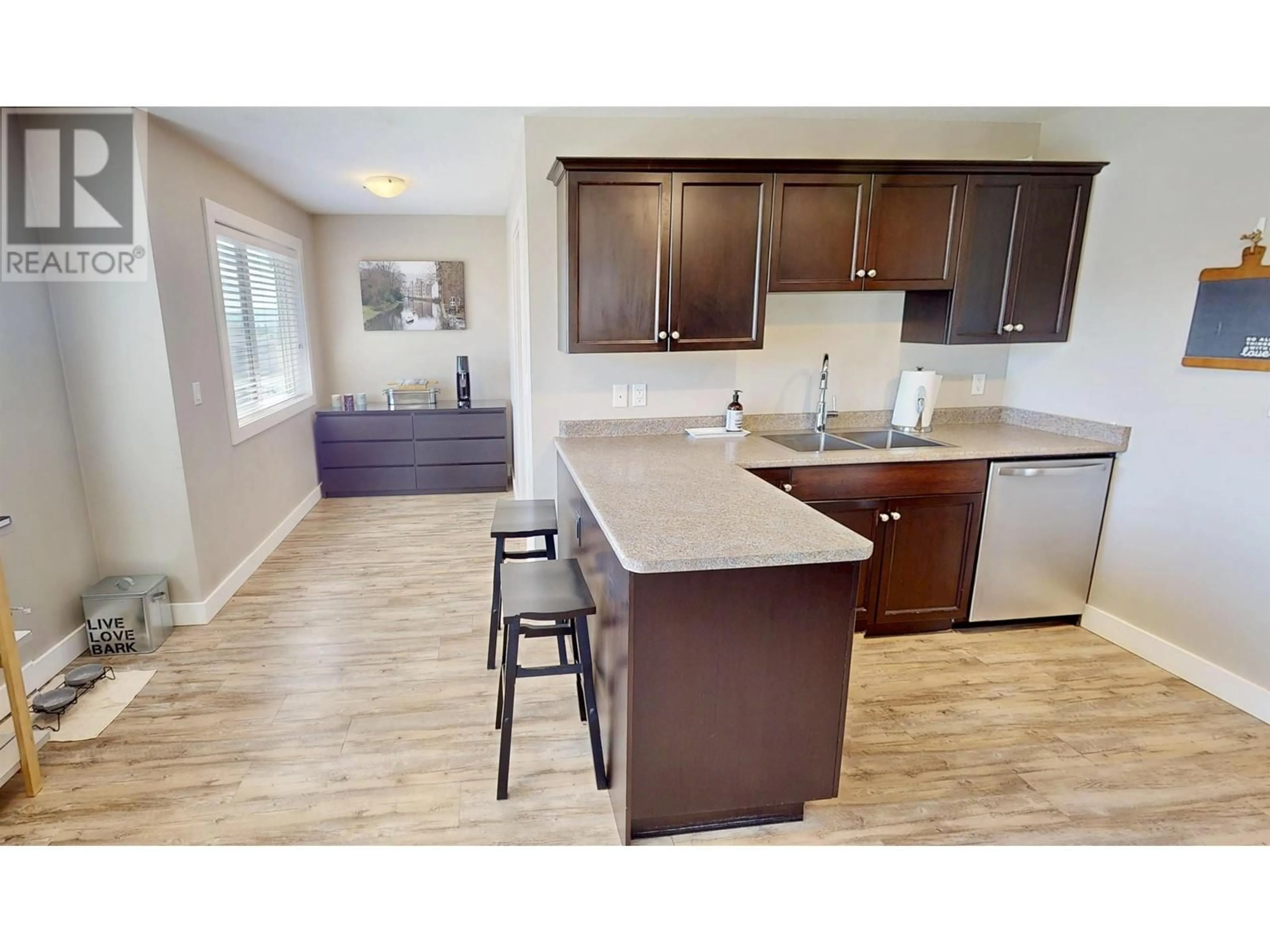 Open concept kitchen, wood/laminate floor for 2 - 9707 99 AVENUE, Taylor British Columbia V0C2K0