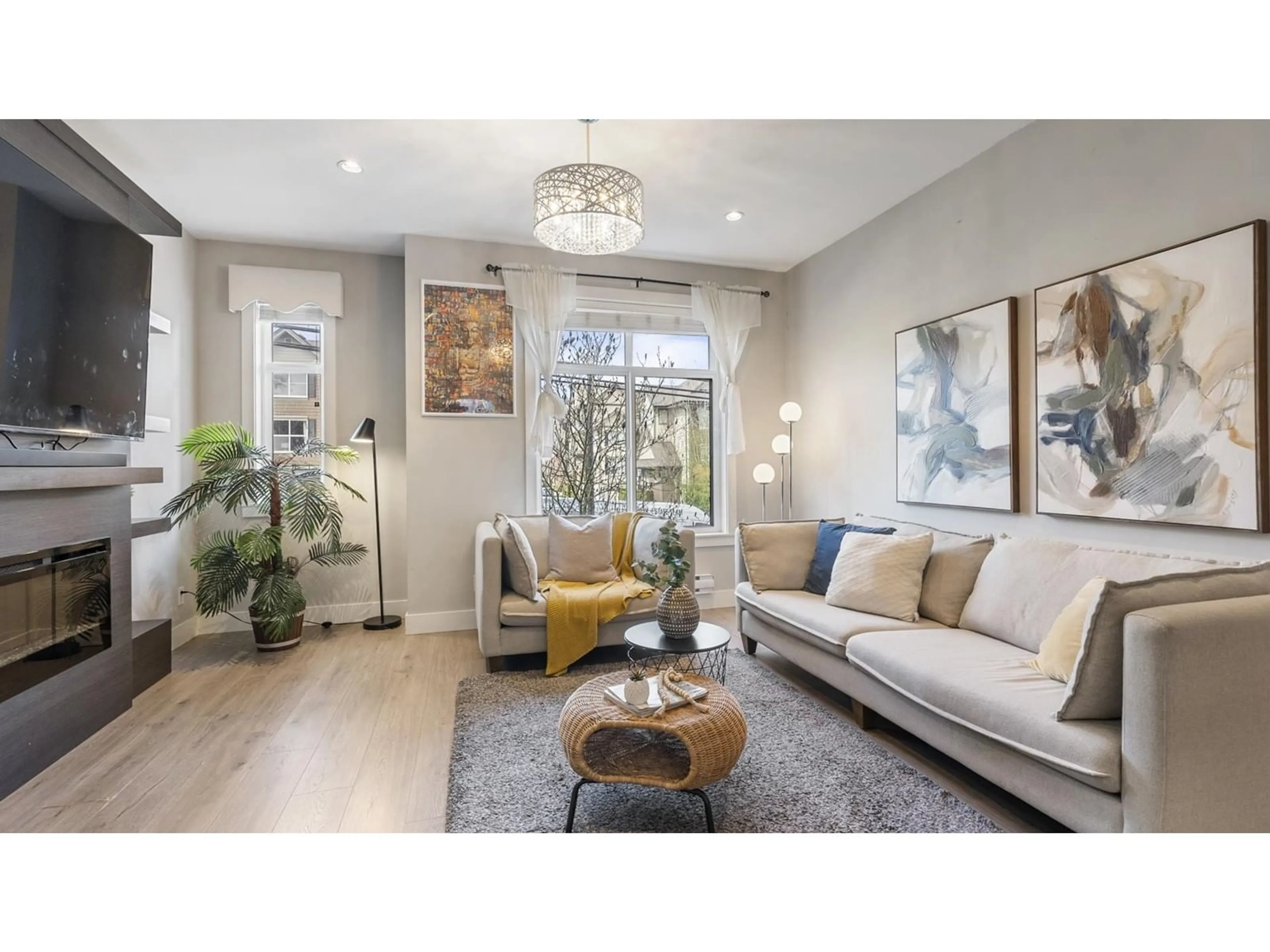 Living room with furniture, wood/laminate floor for 17 - 2888 156, Surrey British Columbia V3Z0C7