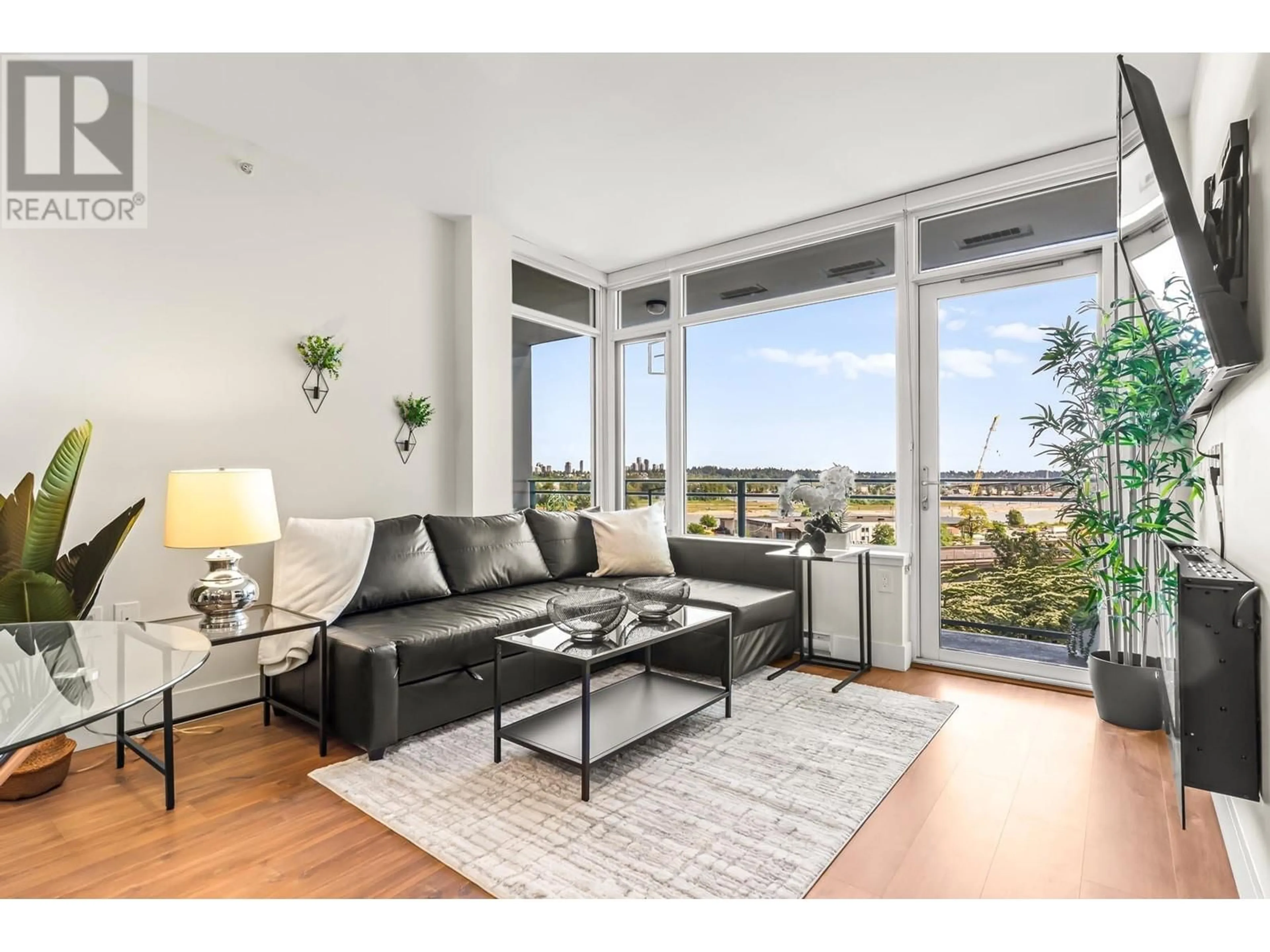 Living room with furniture, wood/laminate floor for 312 - 258 NELSON'S COURT, New Westminster British Columbia V3L0J9