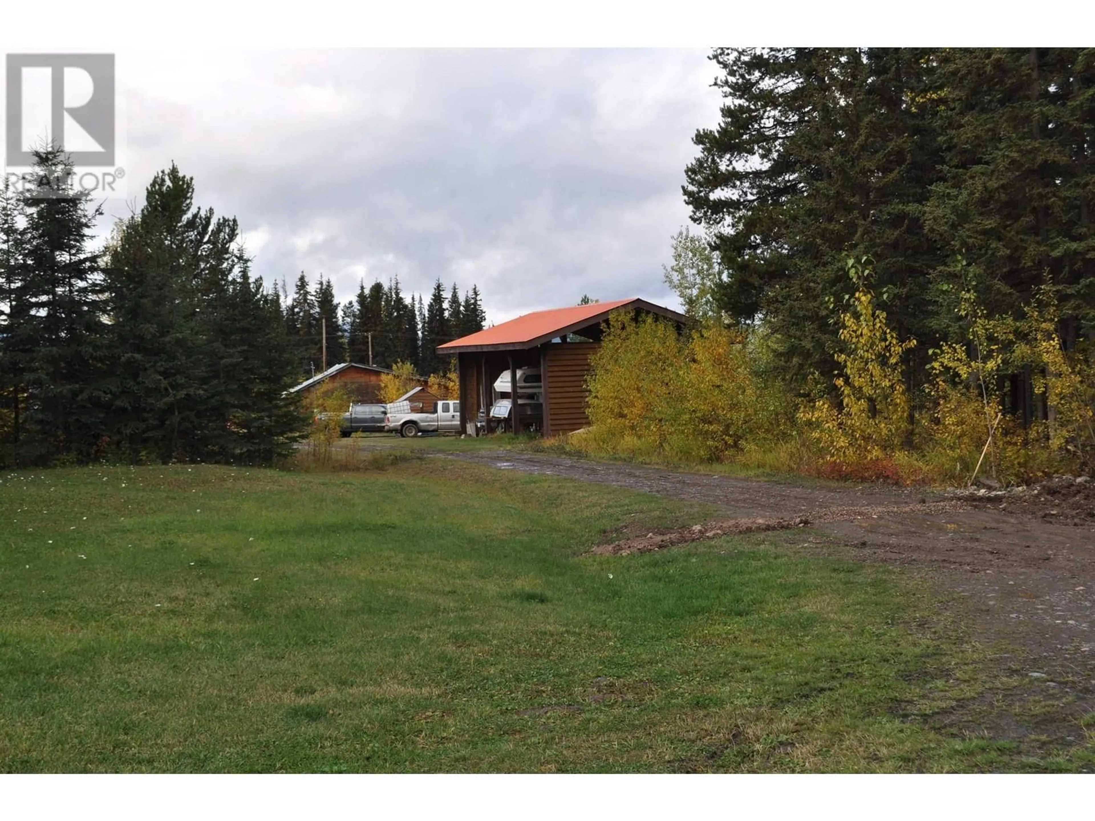 A pic from outside/outdoor area/front of a property/back of a property/a pic from drone, mountain view for 1 - 41522 YELLOWHEAD 16 HIGHWAY, Houston British Columbia V0J1Z1