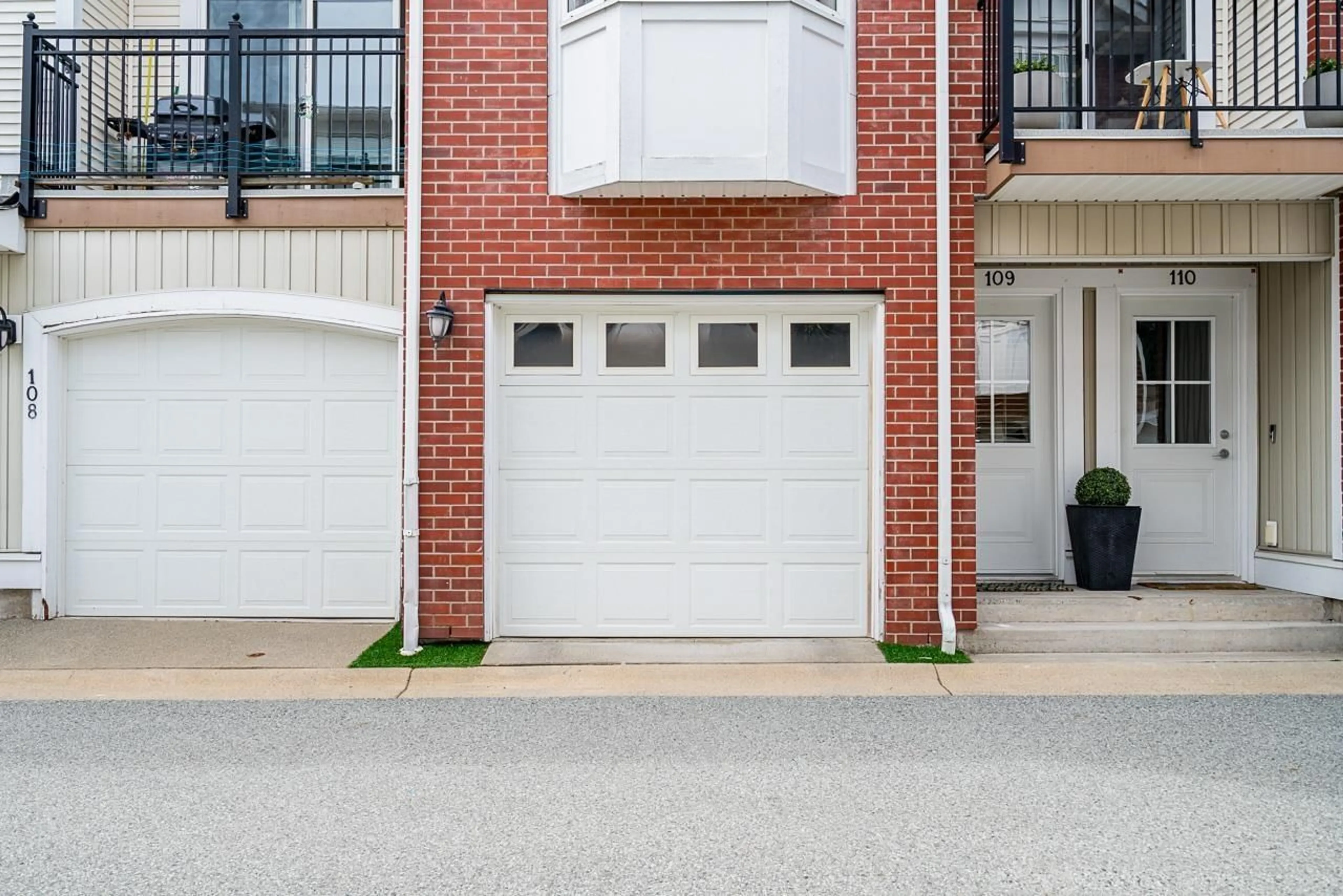 Home with brick exterior material, street for 109 - 19551 66, Surrey British Columbia V4N0Z4