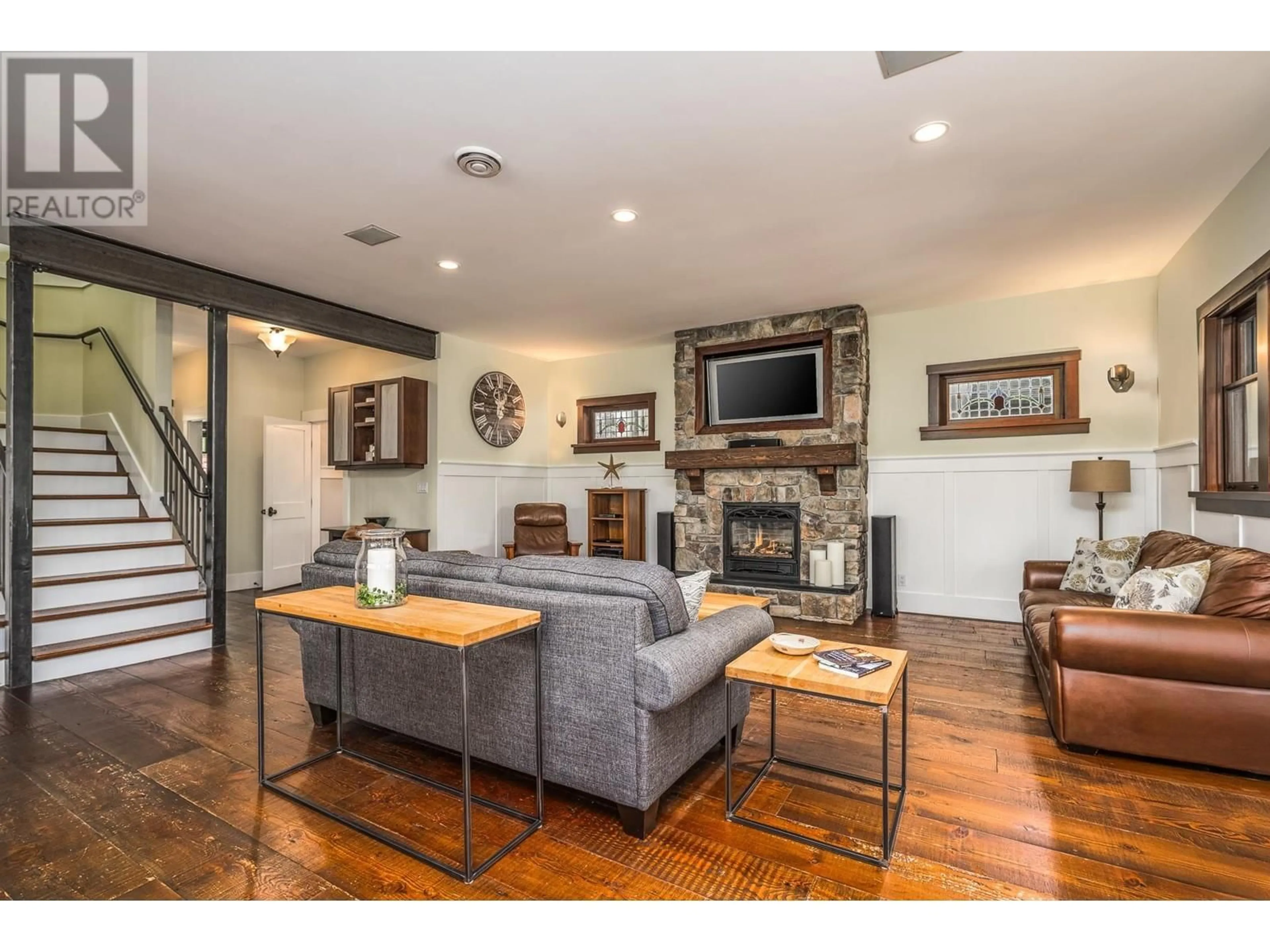 Living room with furniture, wood/laminate floor for 219 65B STREET, Delta British Columbia V4L1M9