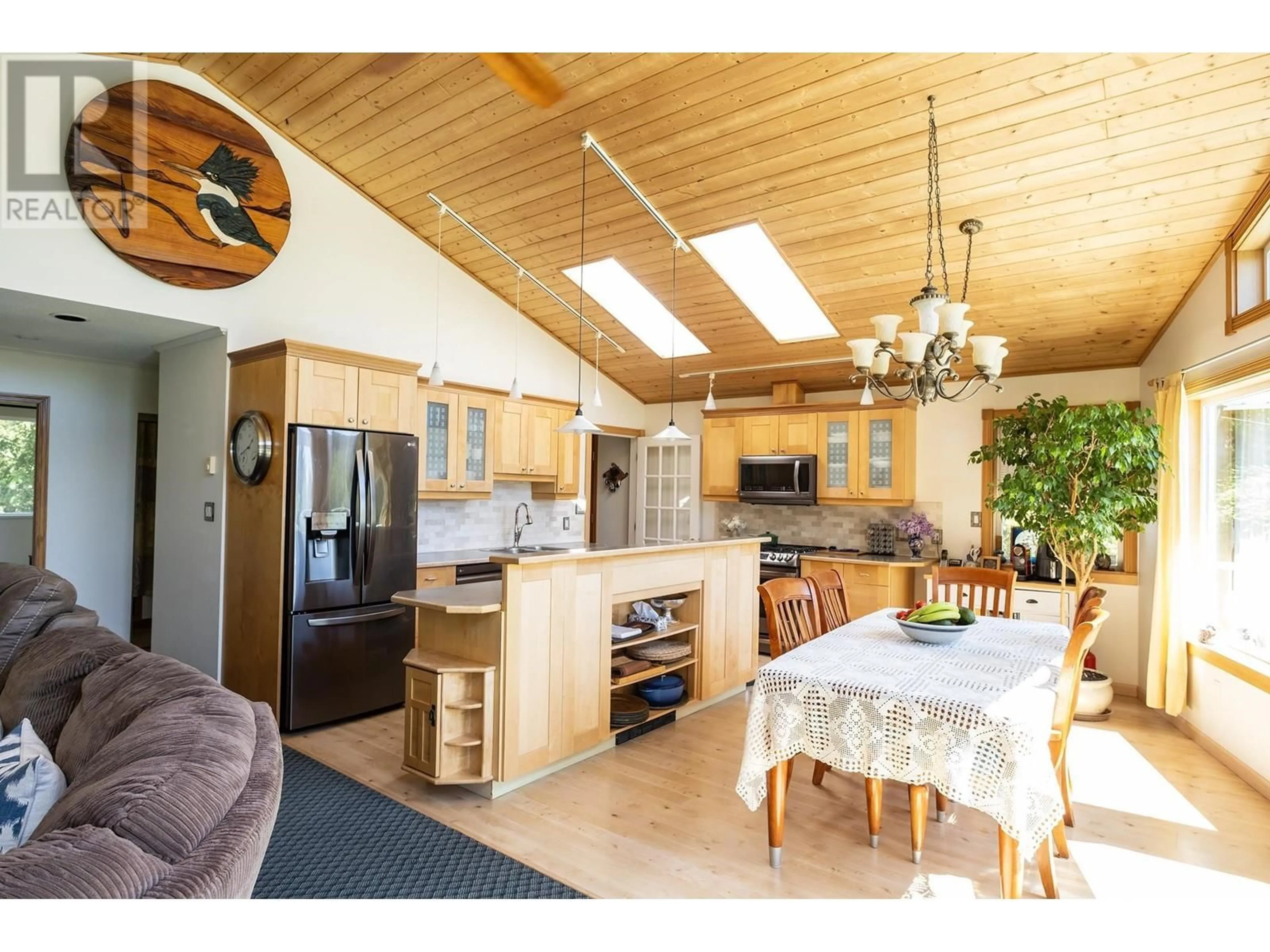Open concept kitchen, wood/laminate floor for 2556 LOWER ROAD, Roberts Creek British Columbia V0N2W4