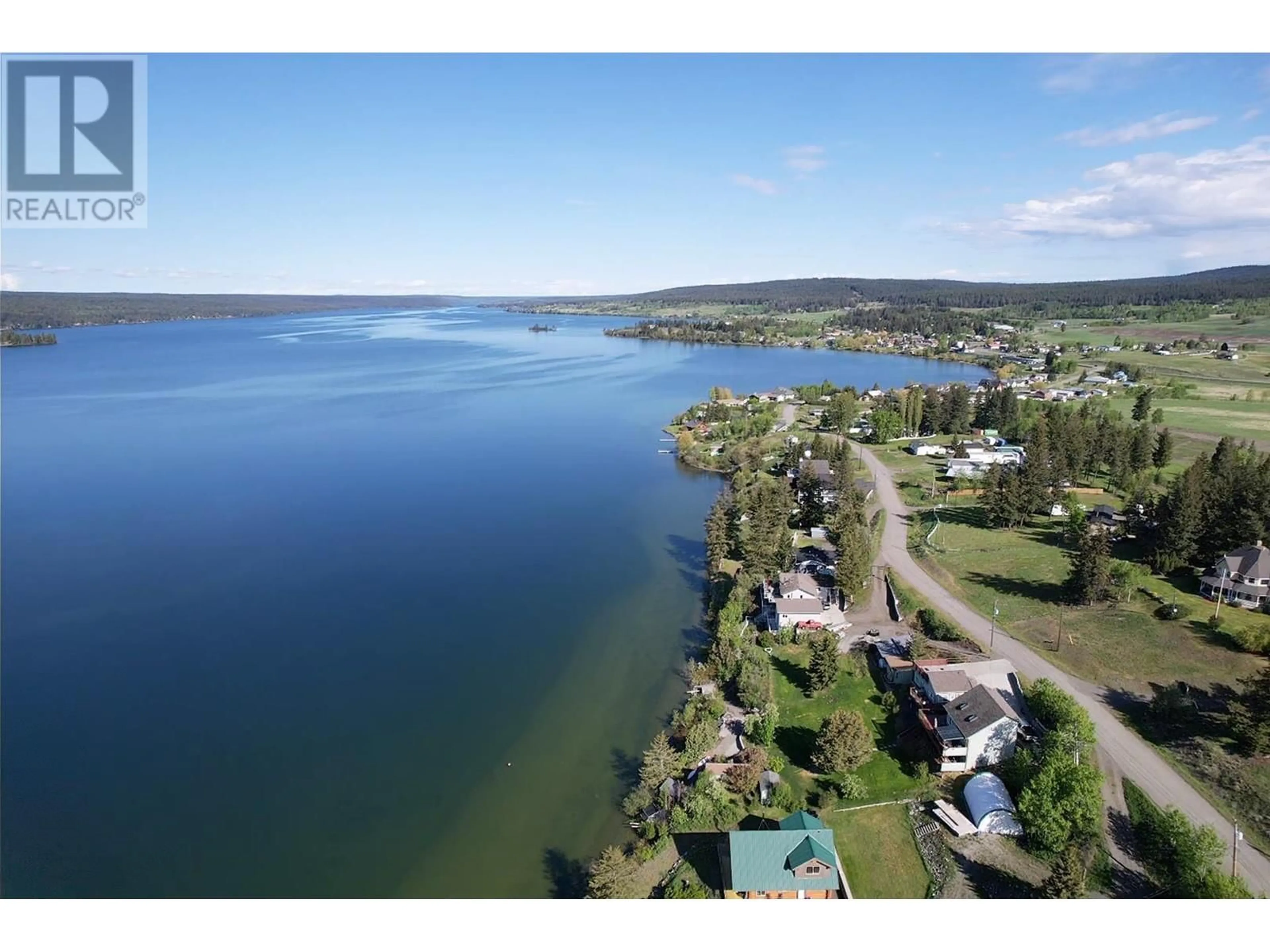 A pic from outside/outdoor area/front of a property/back of a property/a pic from drone, water/lake/river/ocean view for 4116 MCKINLEY DRIVE, Lac La Hache British Columbia V0K1M0