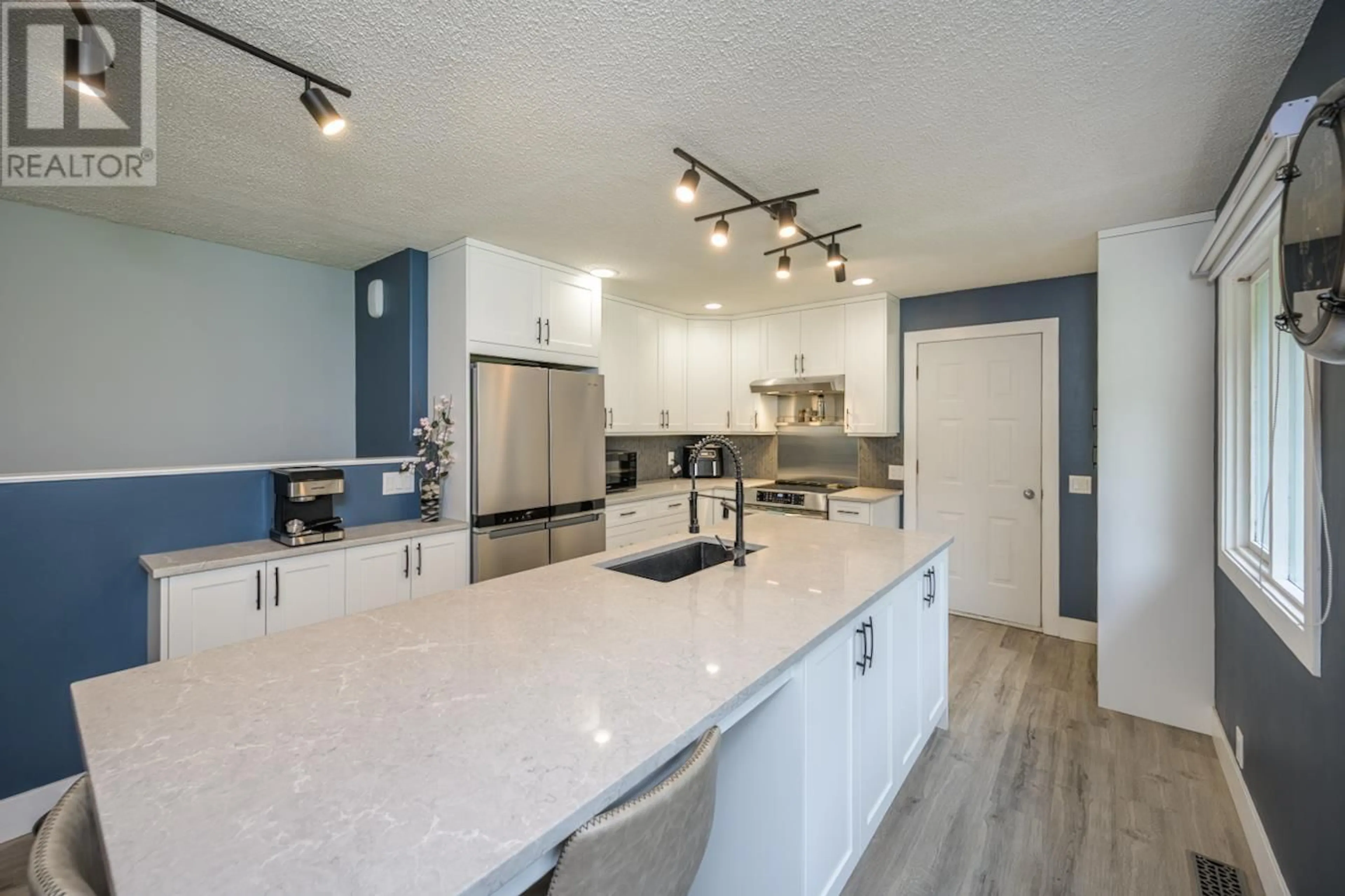 Open concept kitchen, ceramic/tile floor for 3545 MCLARTY CRESCENT, Prince George British Columbia V2K4Z3