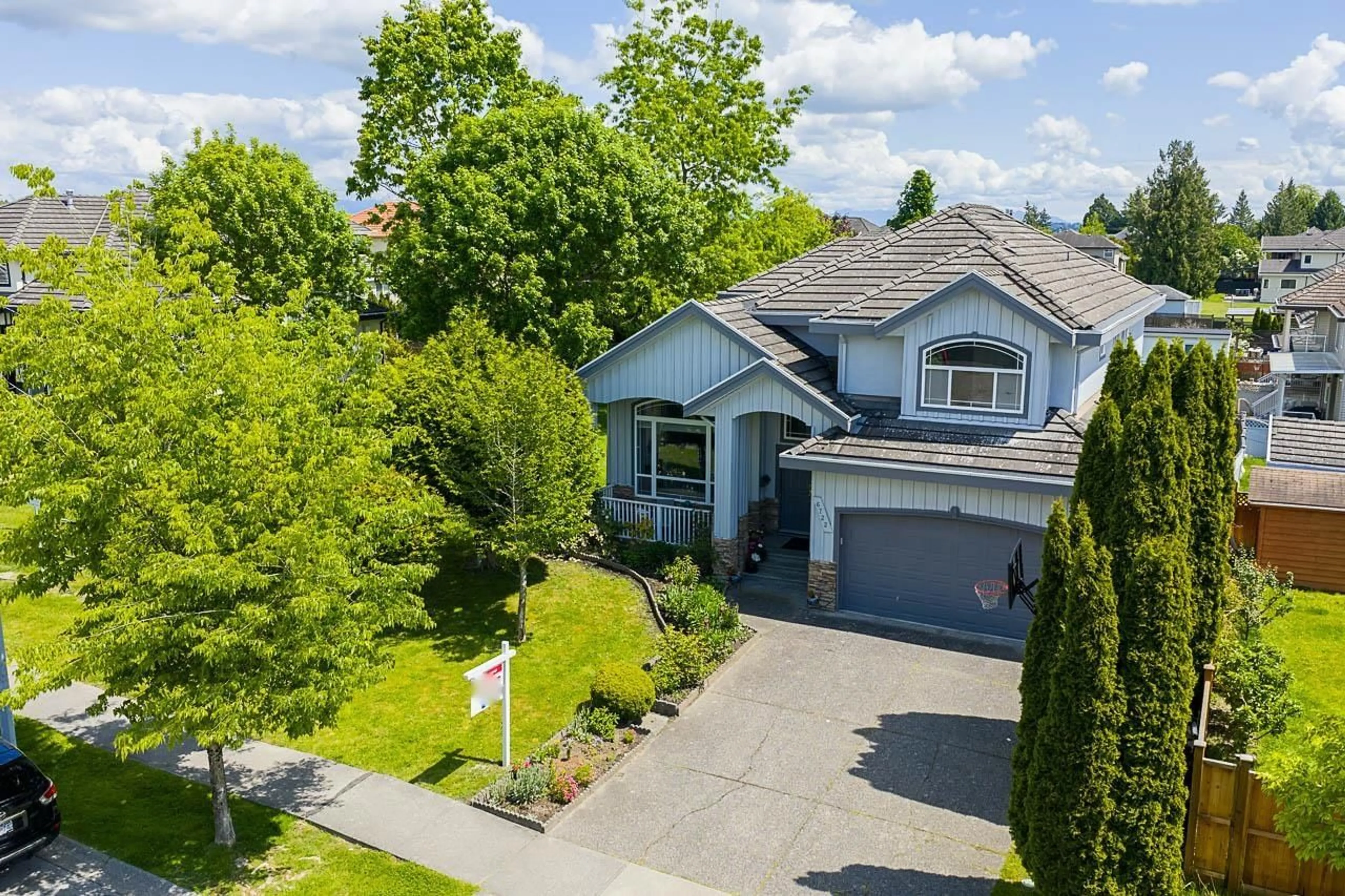 A pic from outside/outdoor area/front of a property/back of a property/a pic from drone, street for 6722 150A, Surrey British Columbia V3S9G6