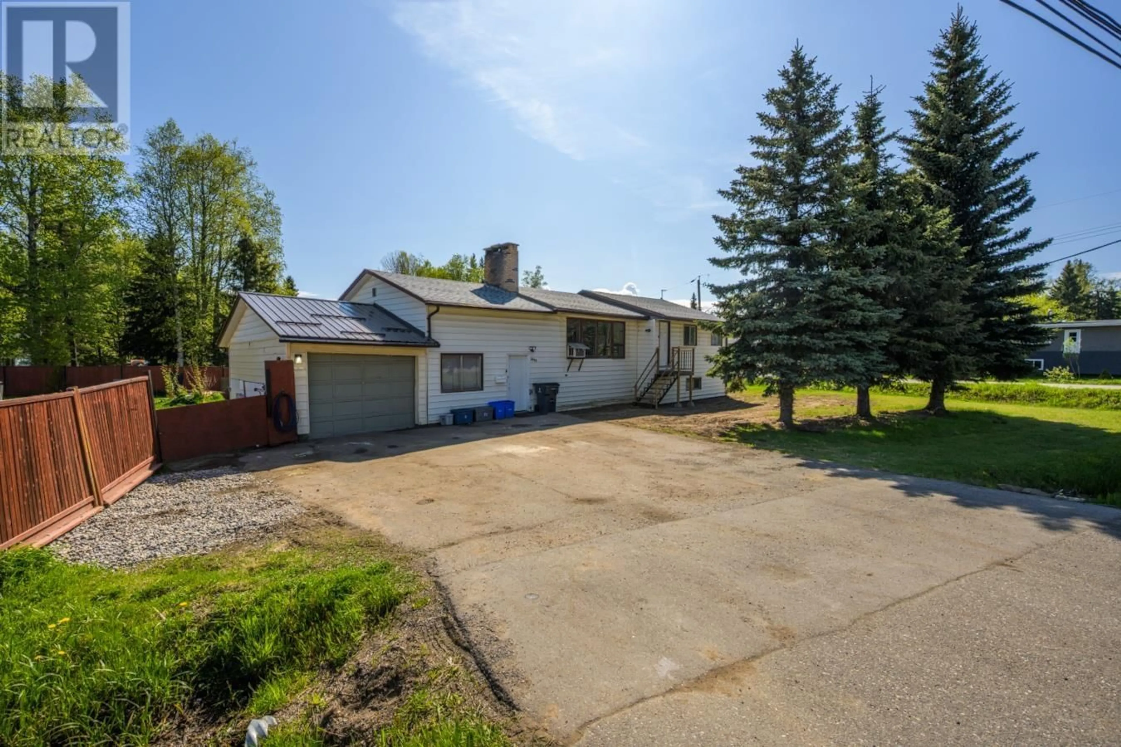 A pic from outside/outdoor area/front of a property/back of a property/a pic from drone, street for 8110 HART HIGHWAY, Prince George British Columbia V2K3B5