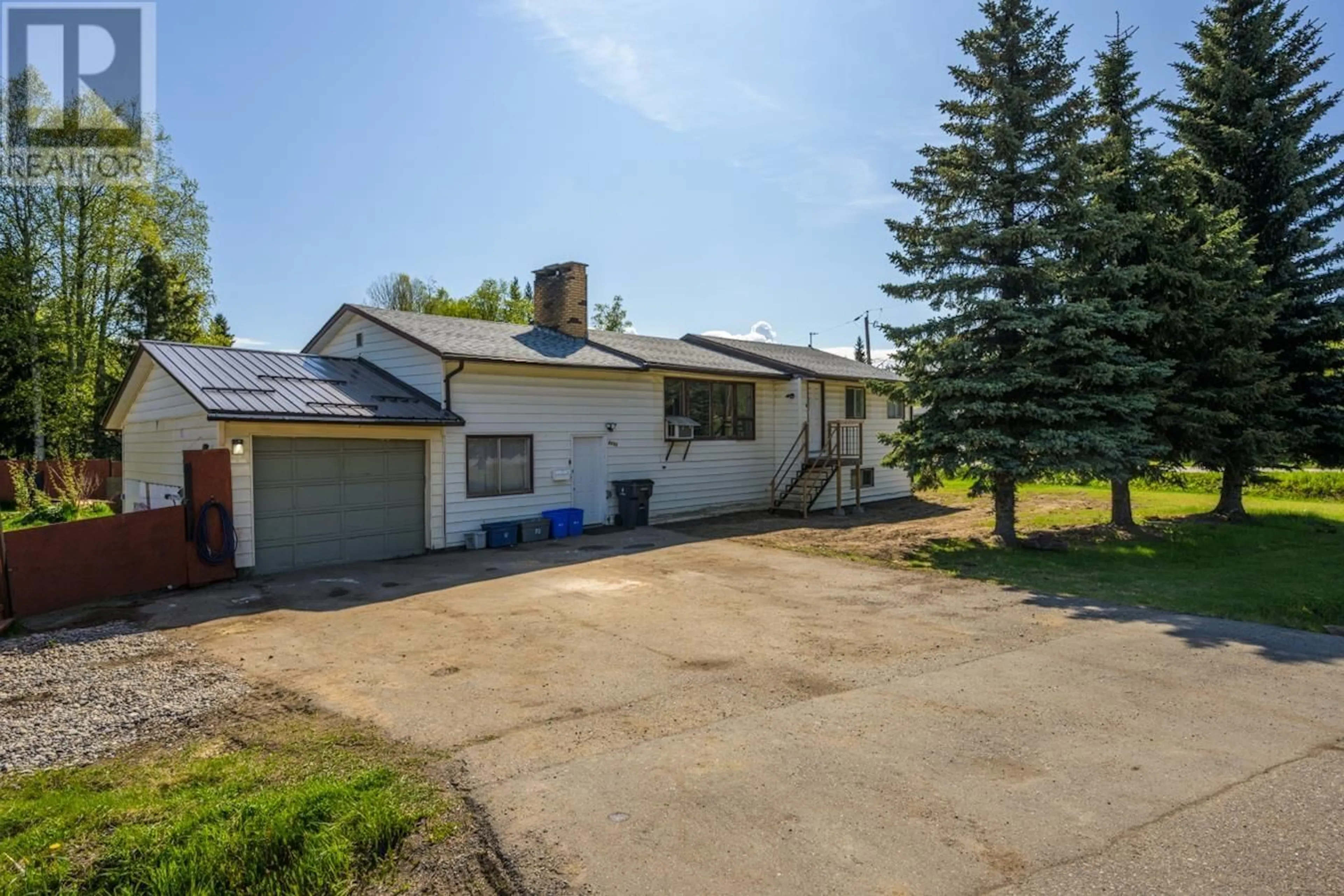 A pic from outside/outdoor area/front of a property/back of a property/a pic from drone, street for 8110 HART HIGHWAY, Prince George British Columbia V2K3B5