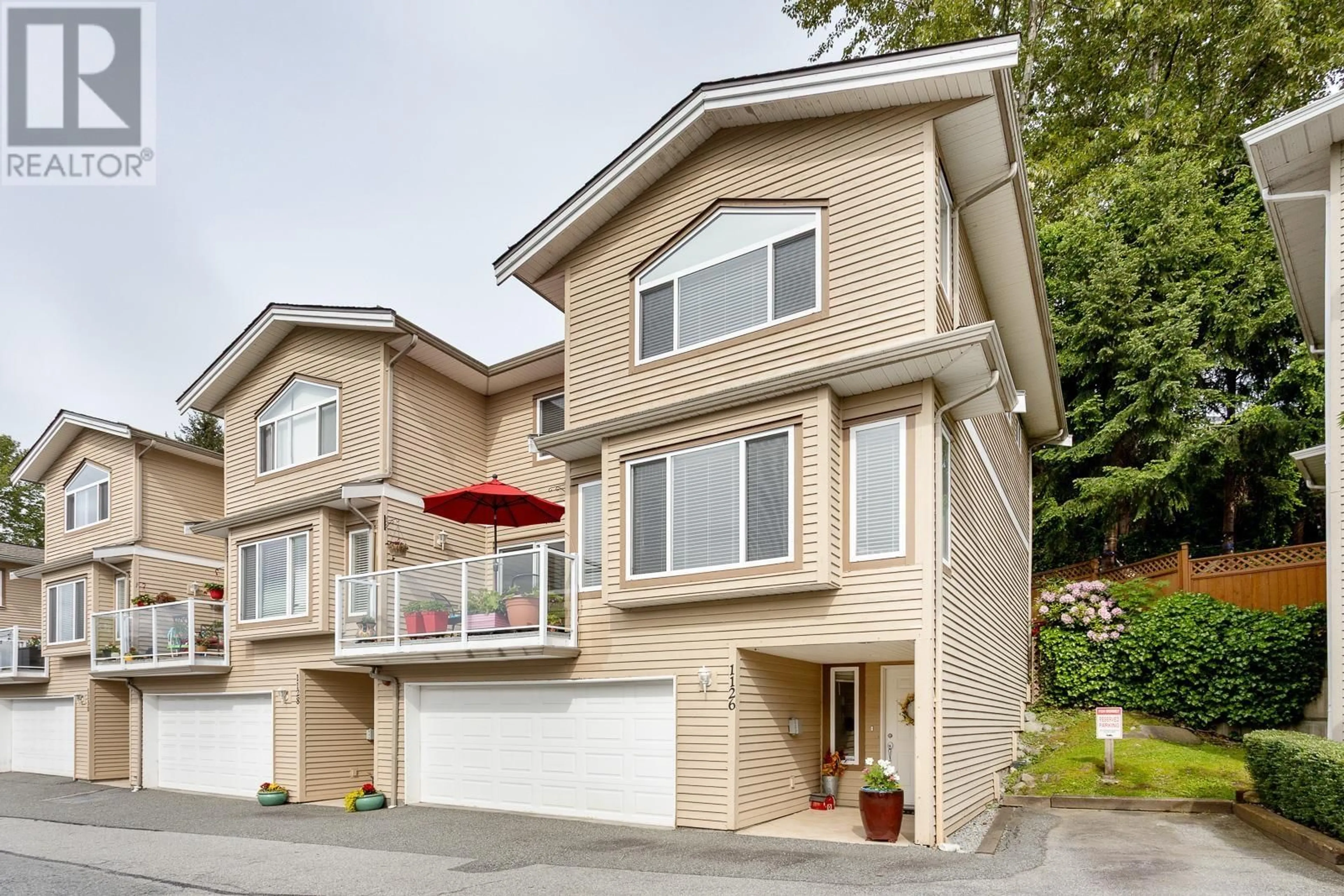 Home with vinyl exterior material, street for 1126 BENNET DRIVE, Port Coquitlam British Columbia V3C6H2