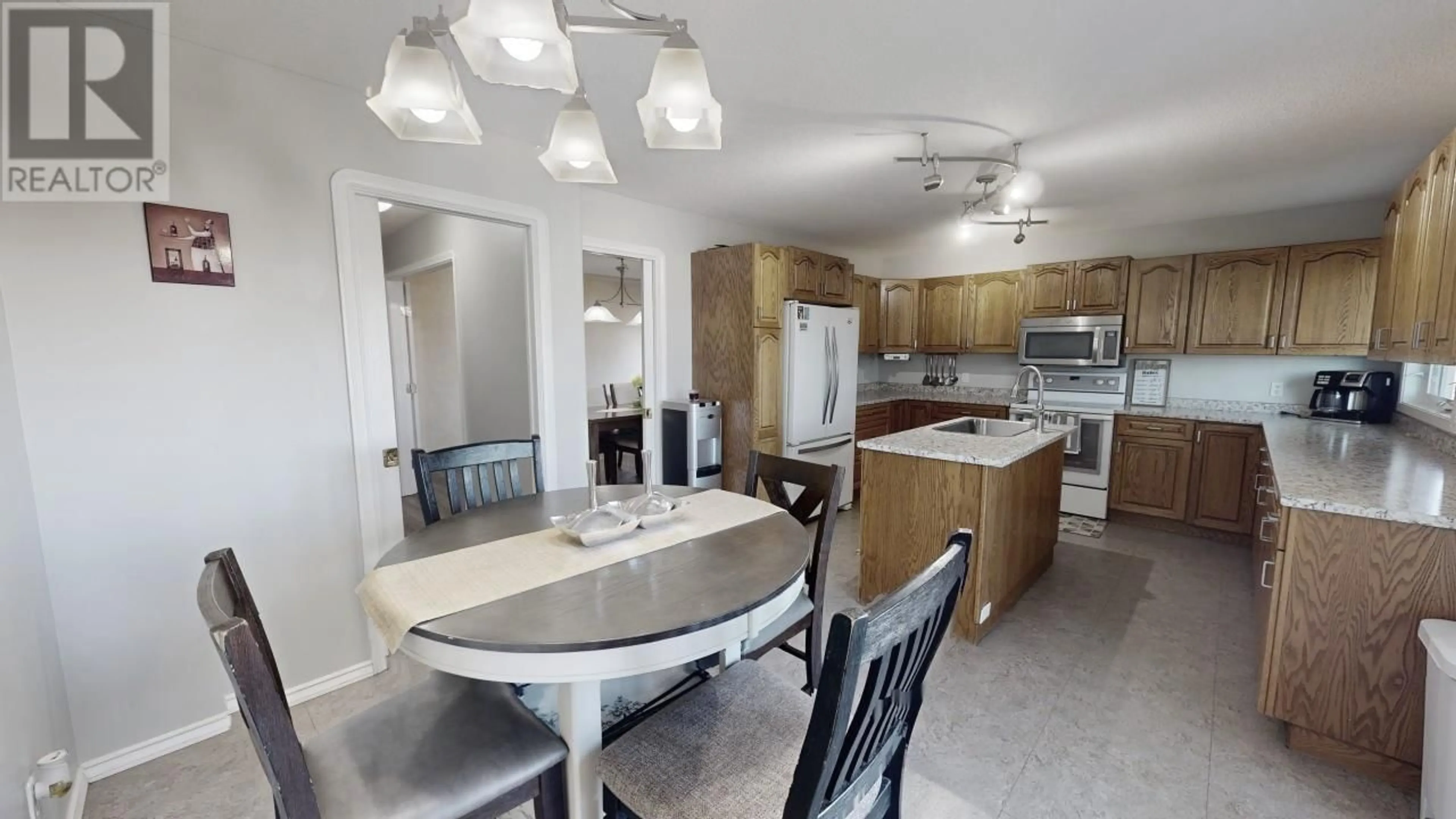 Open concept kitchen, ceramic/tile floor for 9024 114 AVENUE, Fort St. John British Columbia V1J5J1