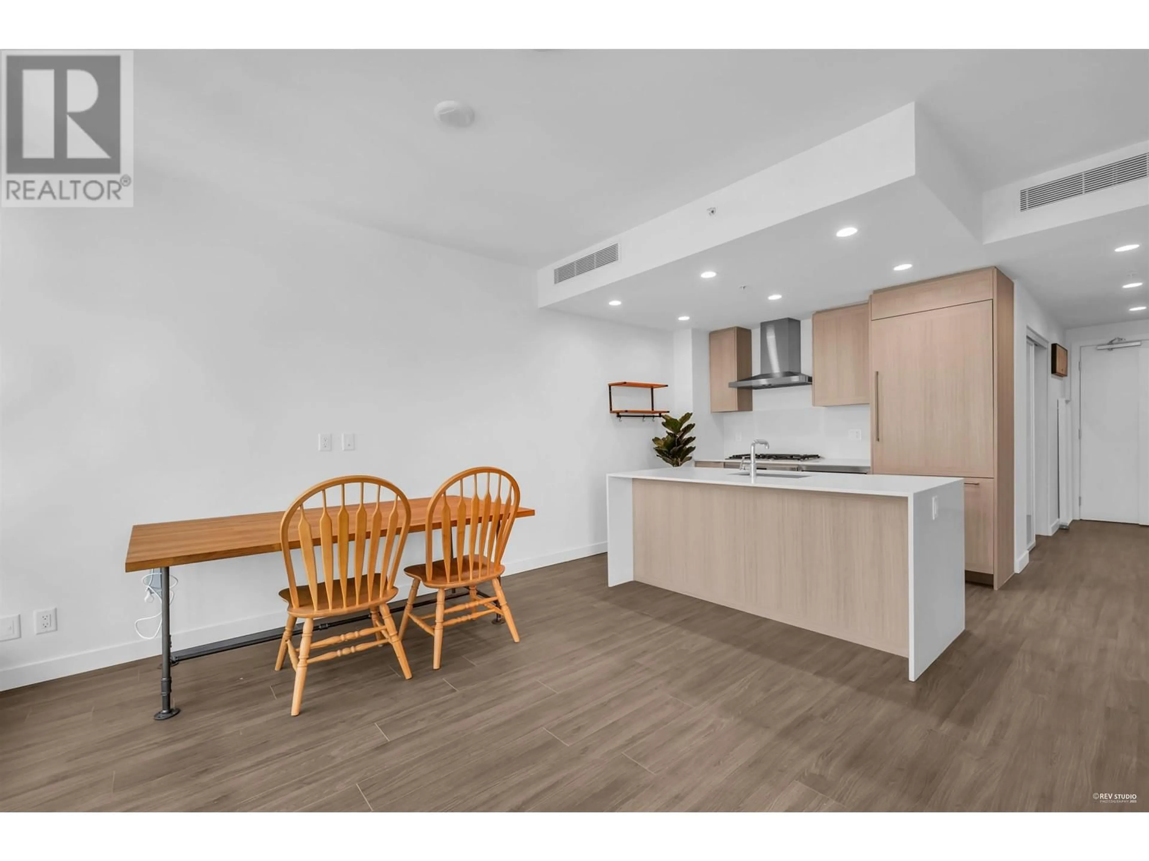 Open concept kitchen, wood/laminate floor for 1009 - 2311 BETA AVENUE, Burnaby British Columbia V5C0M1