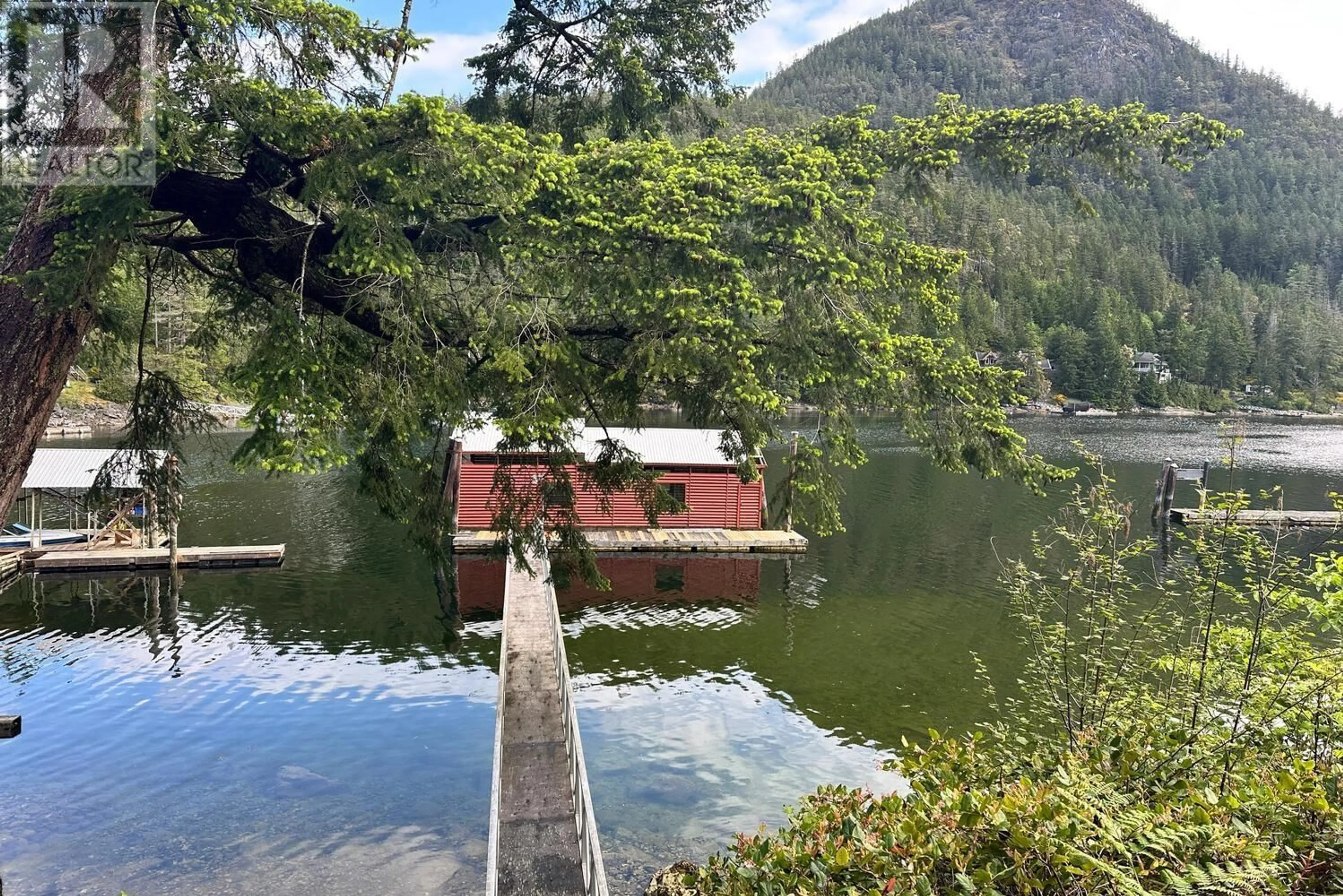 A pic from outside/outdoor area/front of a property/back of a property/a pic from drone, water/lake/river/ocean view for 13119 NARROWS ROAD, Madeira Park British Columbia V0N2H1