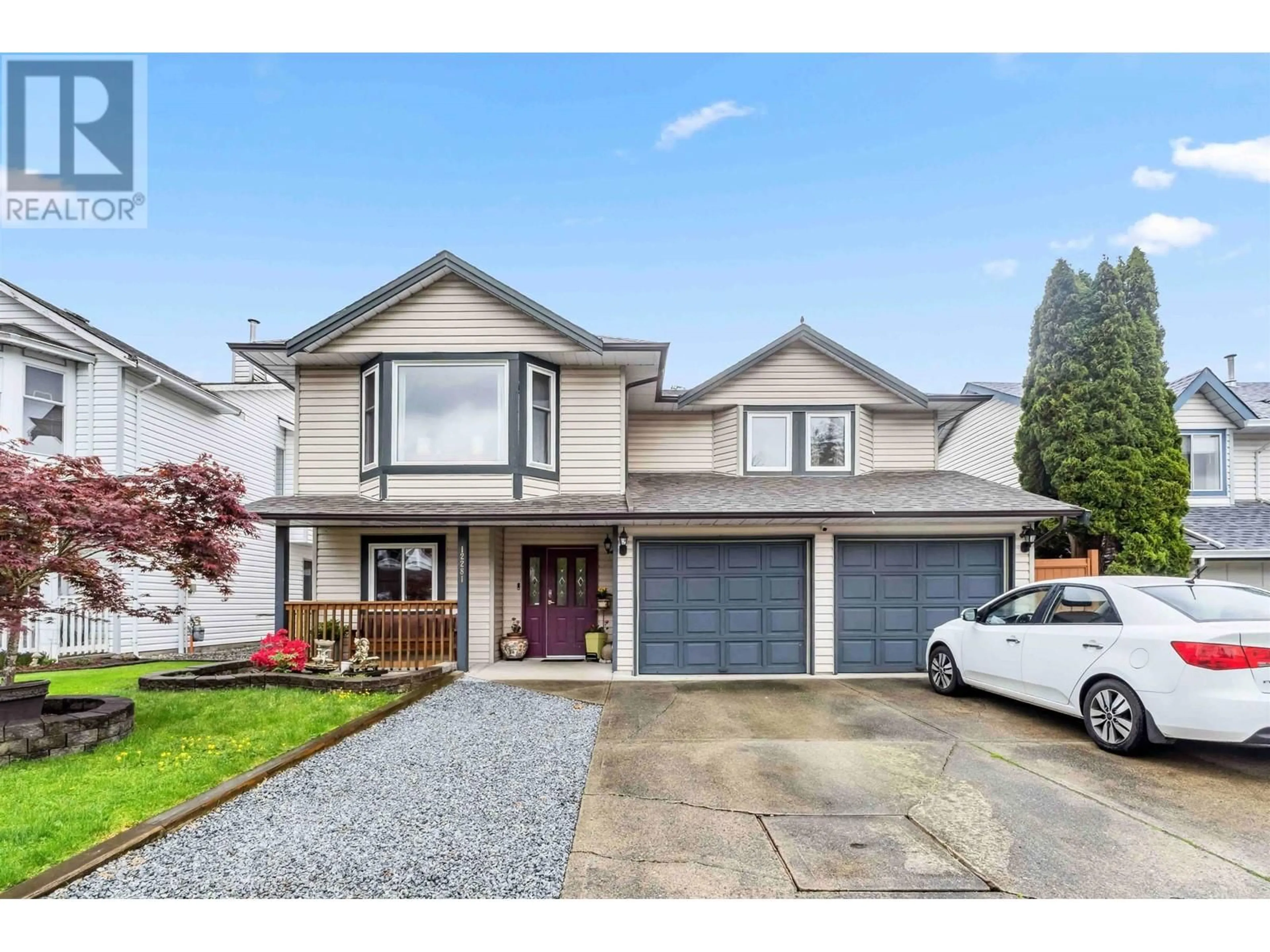 Home with vinyl exterior material, street for 12281 233A STREET, Maple Ridge British Columbia V2X0P7