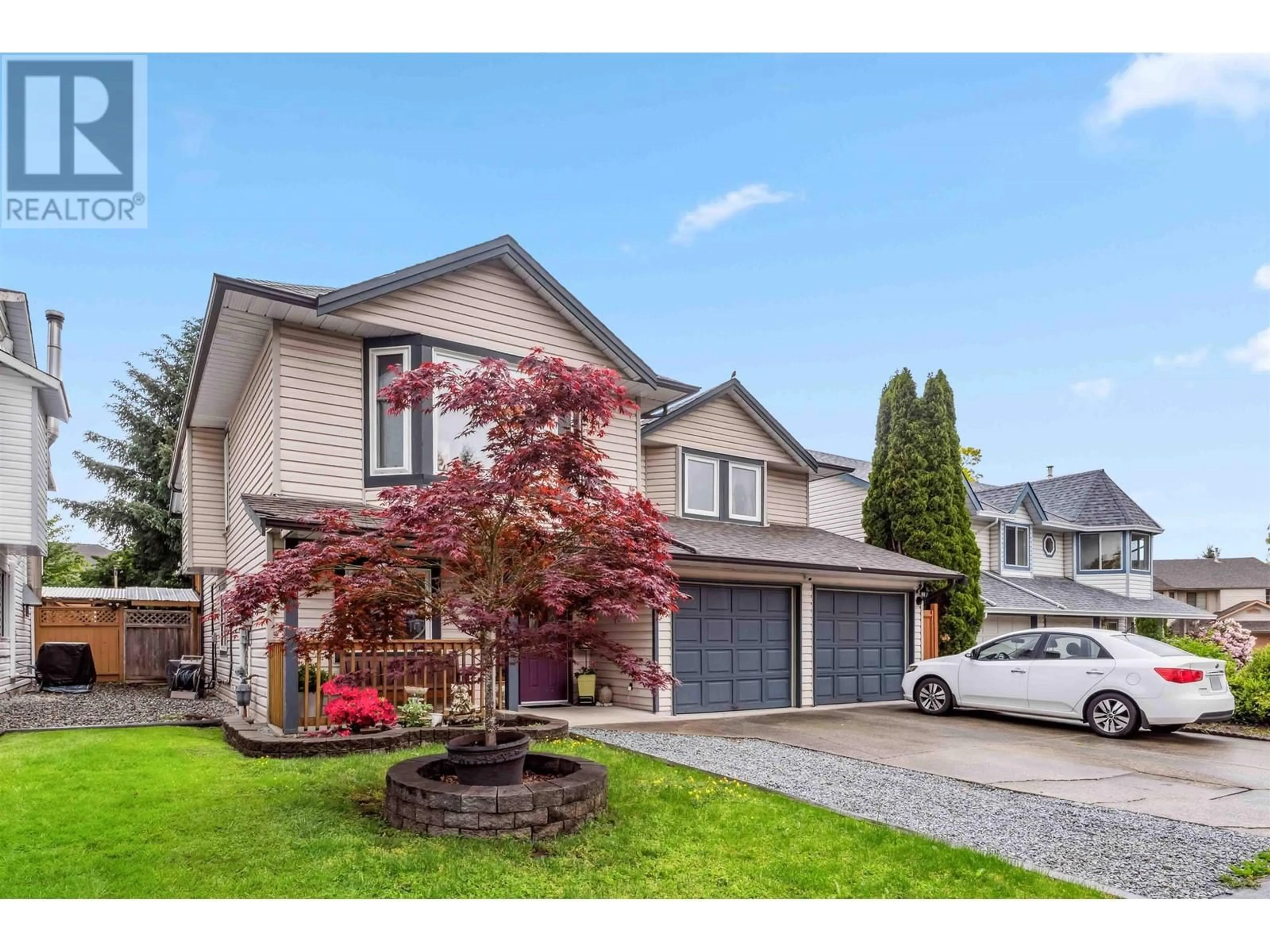 Home with vinyl exterior material, street for 12281 233A STREET, Maple Ridge British Columbia V2X0P7