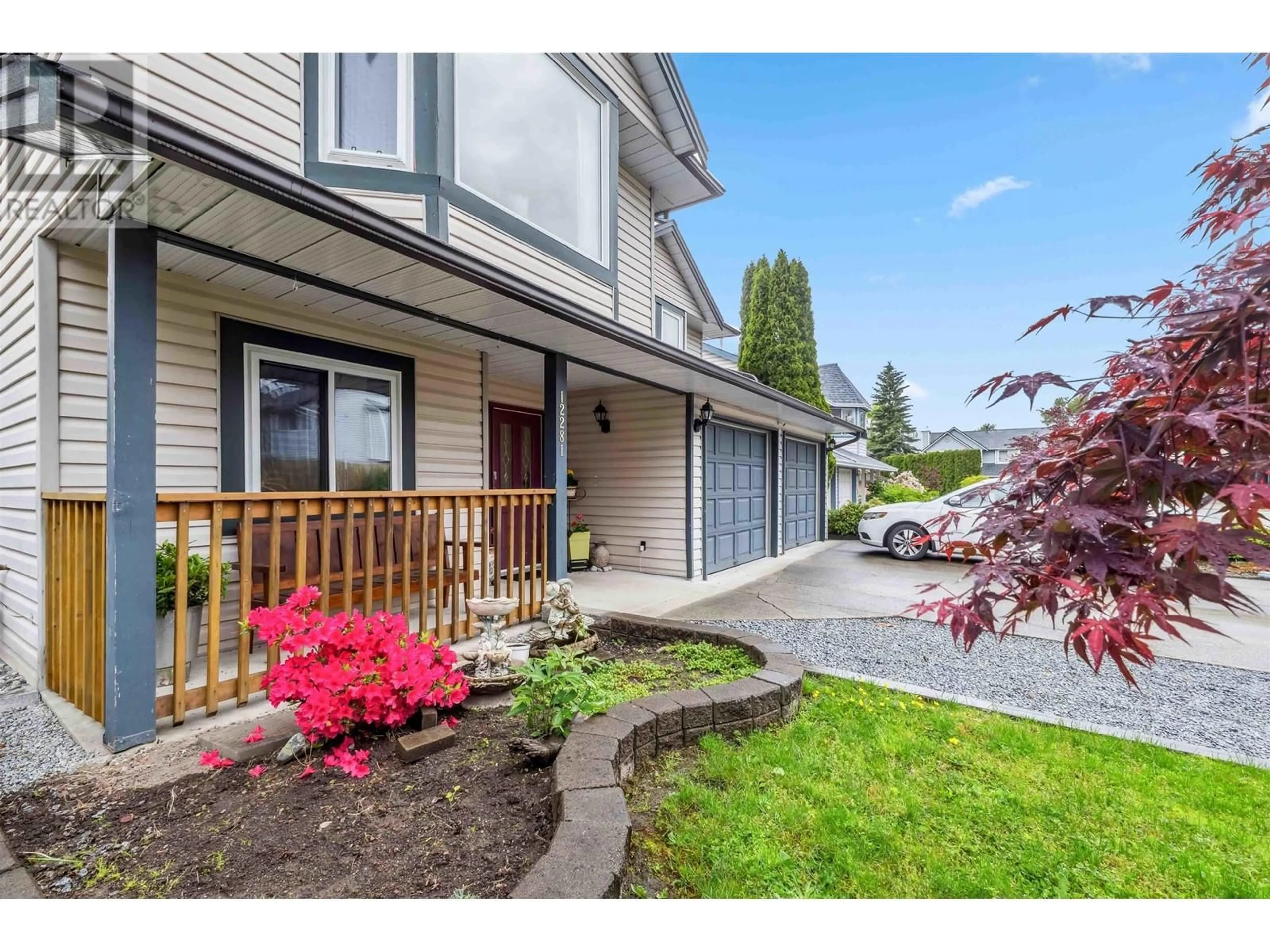 Home with vinyl exterior material, street for 12281 233A STREET, Maple Ridge British Columbia V2X0P7