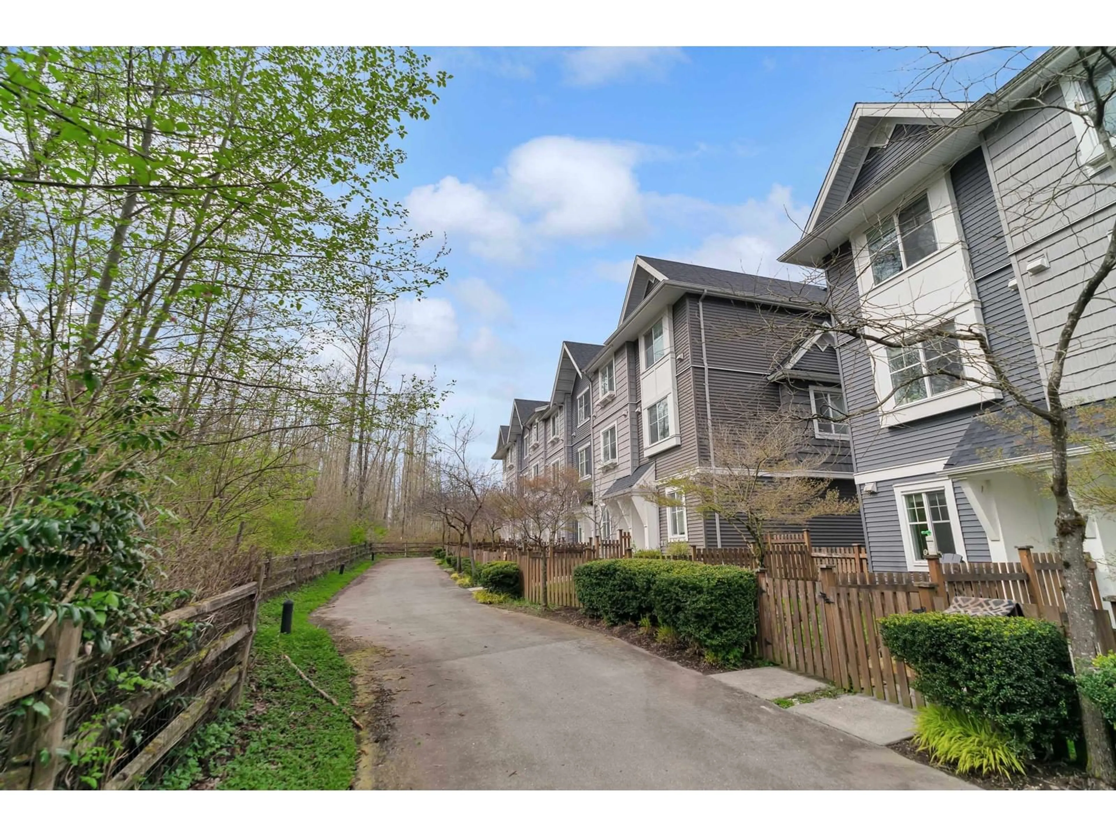 A pic from outside/outdoor area/front of a property/back of a property/a pic from drone, street for 20 - 19128 65, Surrey British Columbia V4N6P2