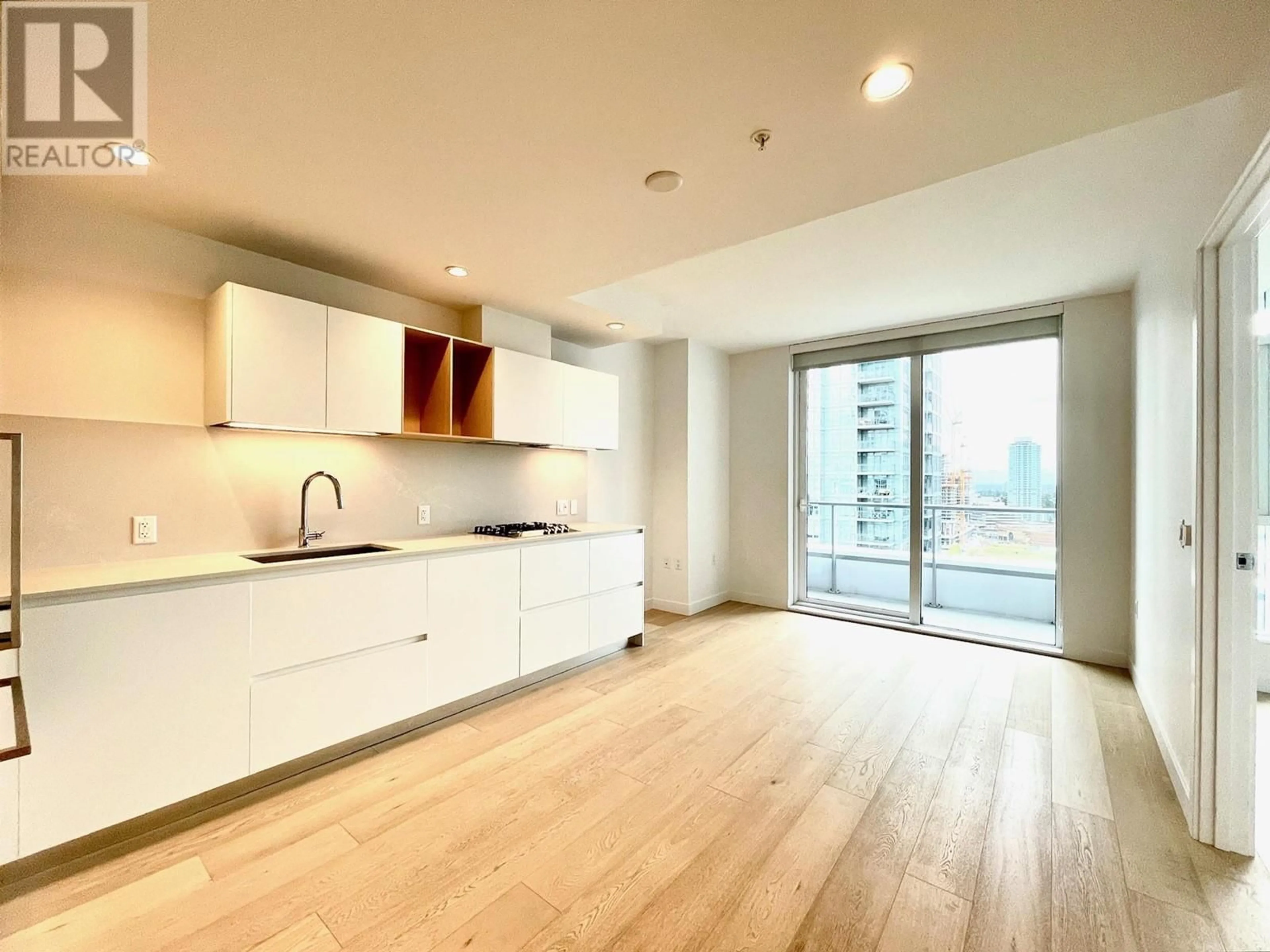 Open concept kitchen, wood/laminate floor for 1901 - 6000 MCKAY AVENUE, Burnaby British Columbia V5H0K2
