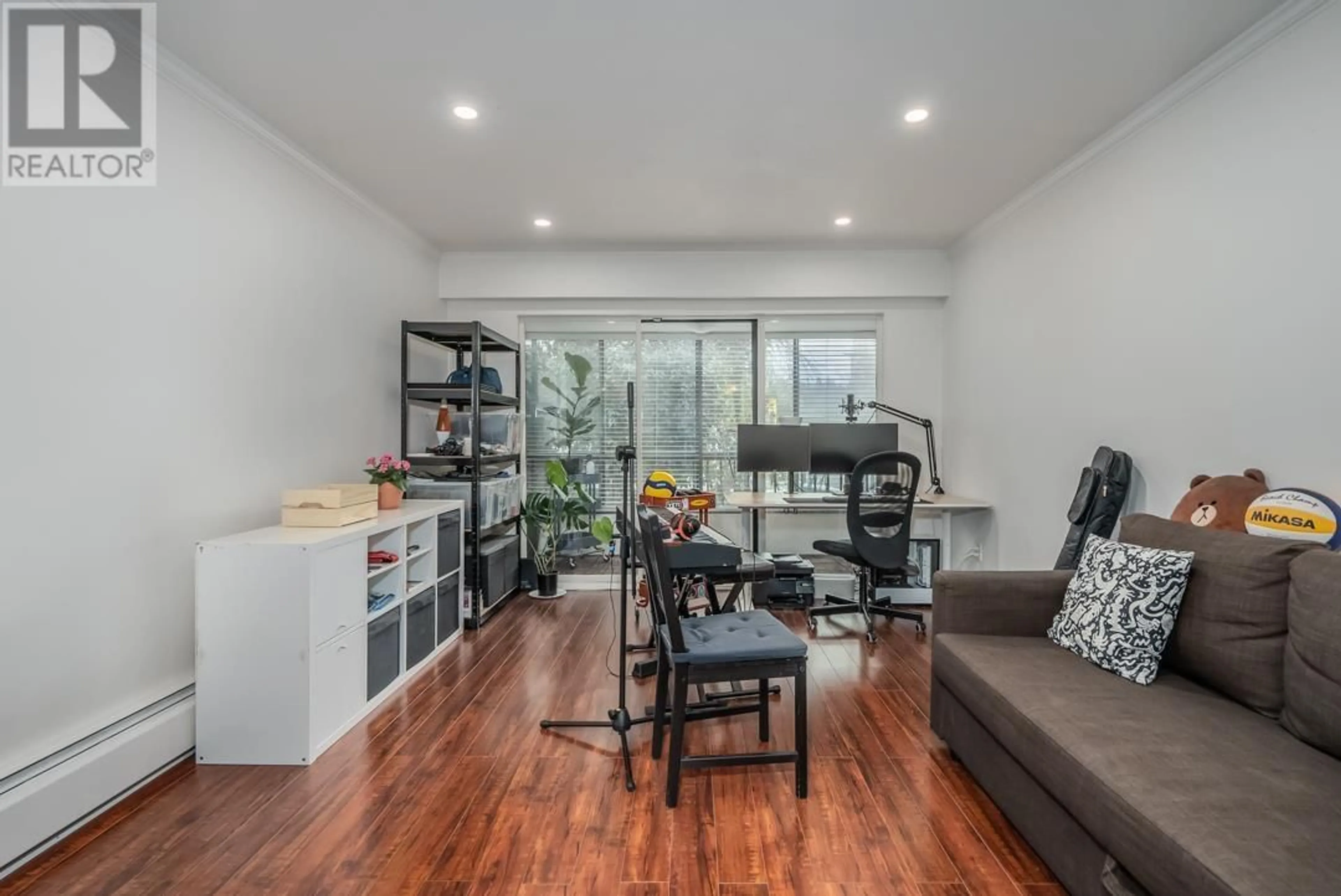 Living room with furniture, wood/laminate floor for 111 - 3787 4TH AVENUE, Vancouver British Columbia V6R1P4