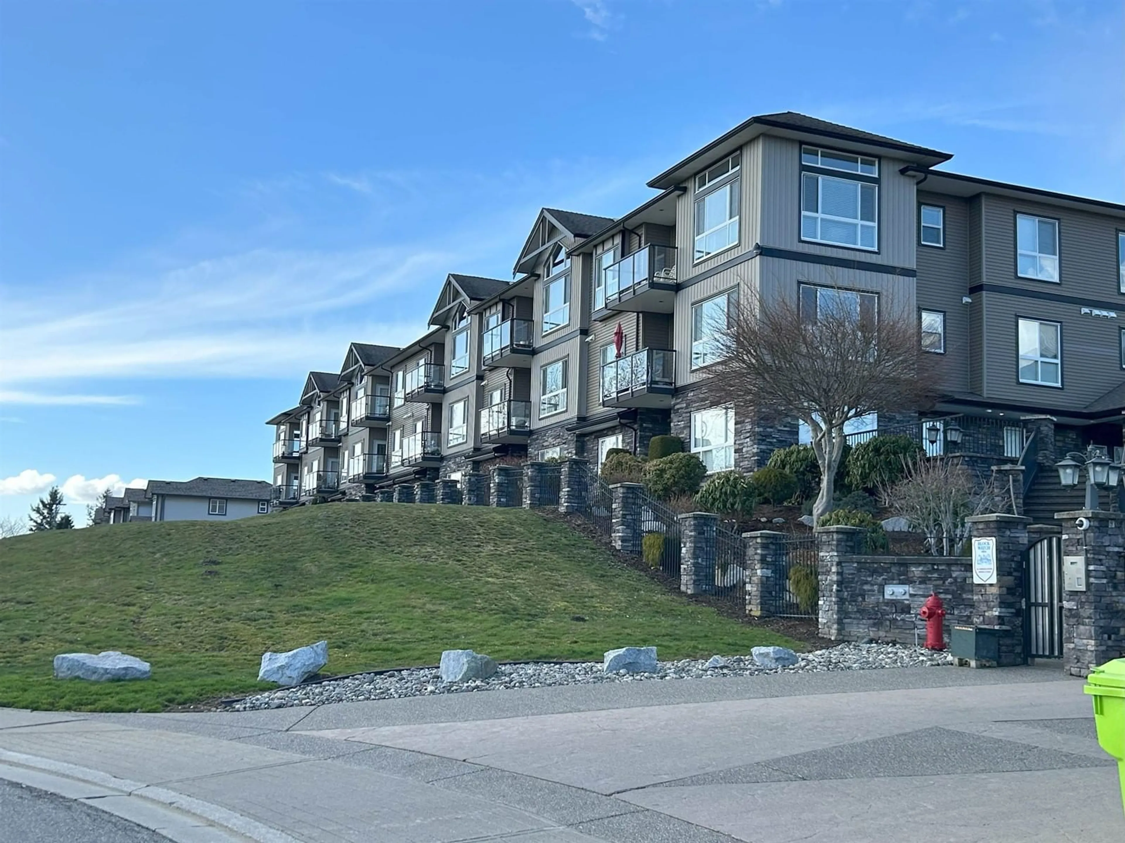 A pic from outside/outdoor area/front of a property/back of a property/a pic from drone, mountain view for A314 - 33755 7TH, Mission British Columbia V2V0A4