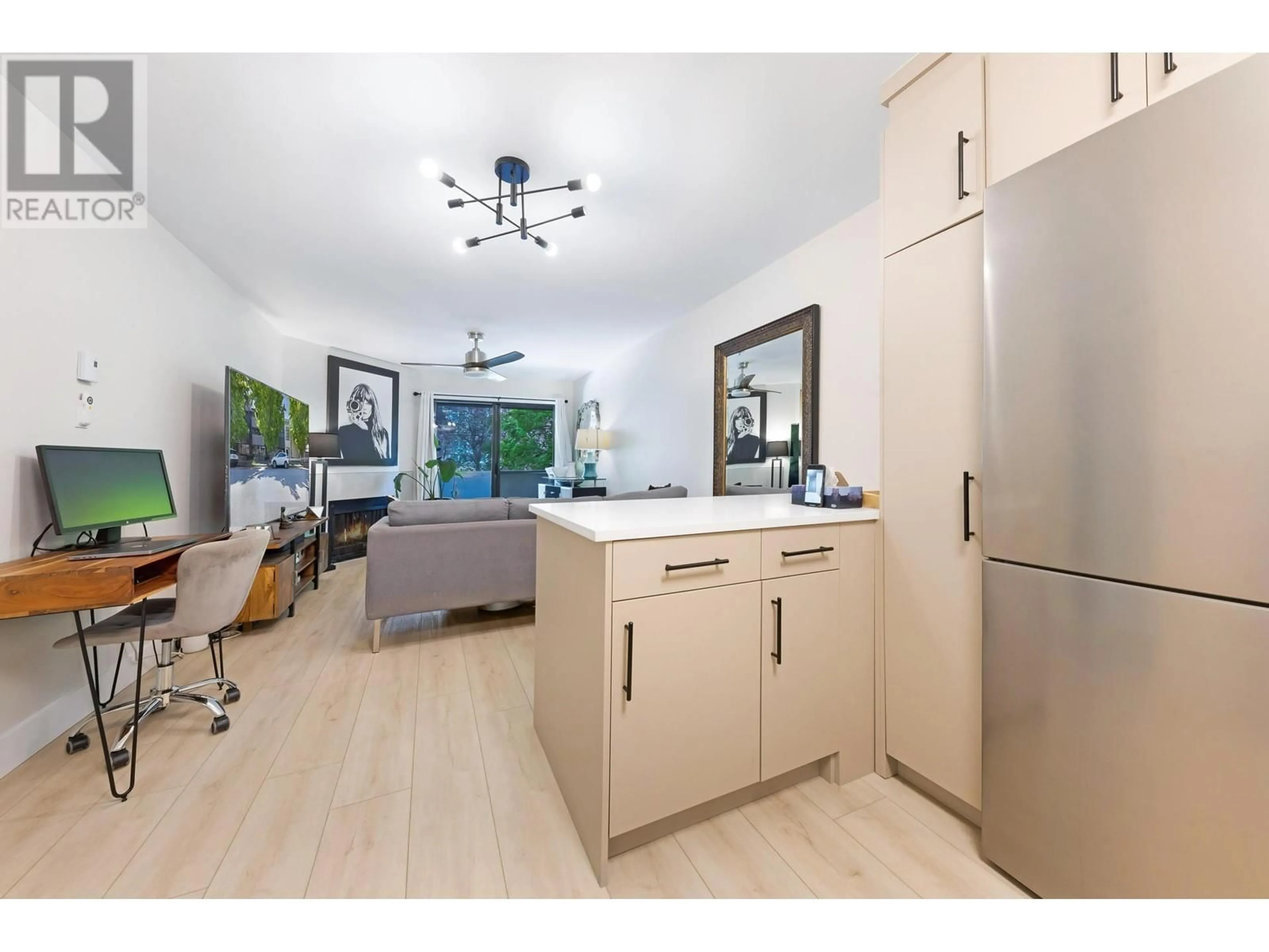 Open concept kitchen, wood/laminate floor for 104 - 3255 HEATHER STREET, Vancouver British Columbia V5Z3K4