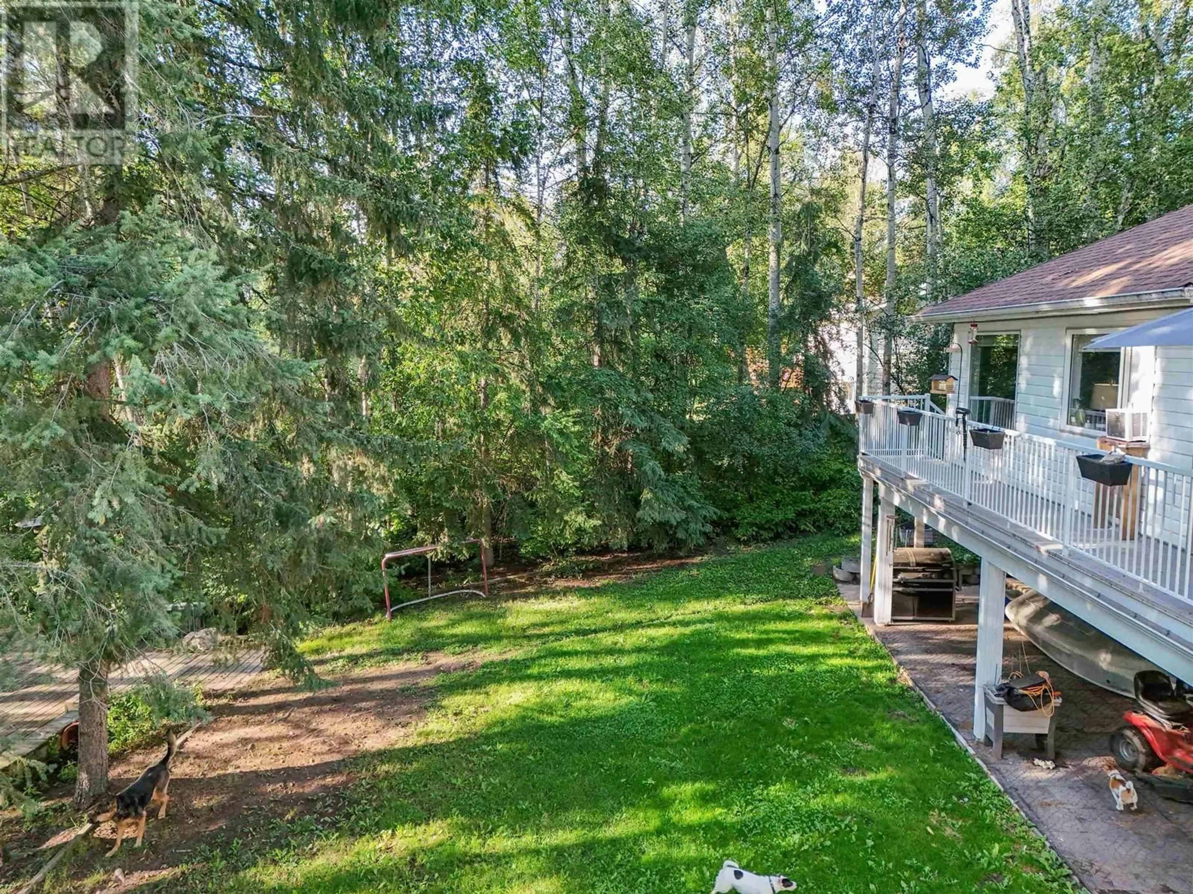 A pic from outside/outdoor area/front of a property/back of a property/a pic from drone, forest/trees view for 221 PHILLIPS ROAD, Quesnel British Columbia V2J4G6
