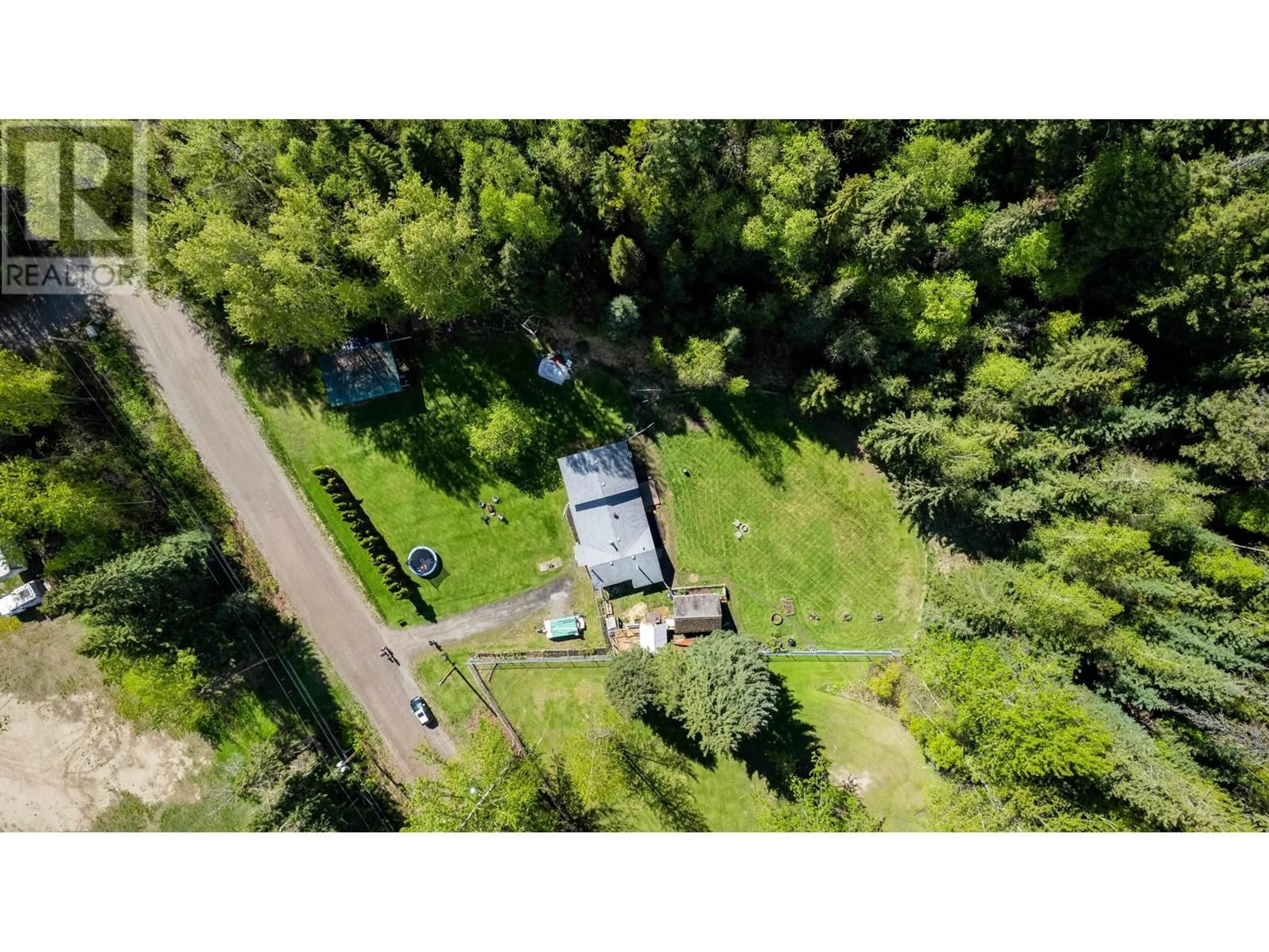 A pic from outside/outdoor area/front of a property/back of a property/a pic from drone, forest/trees view for 1700 FRASER FLATS ROAD, Prince George British Columbia V2K5S4
