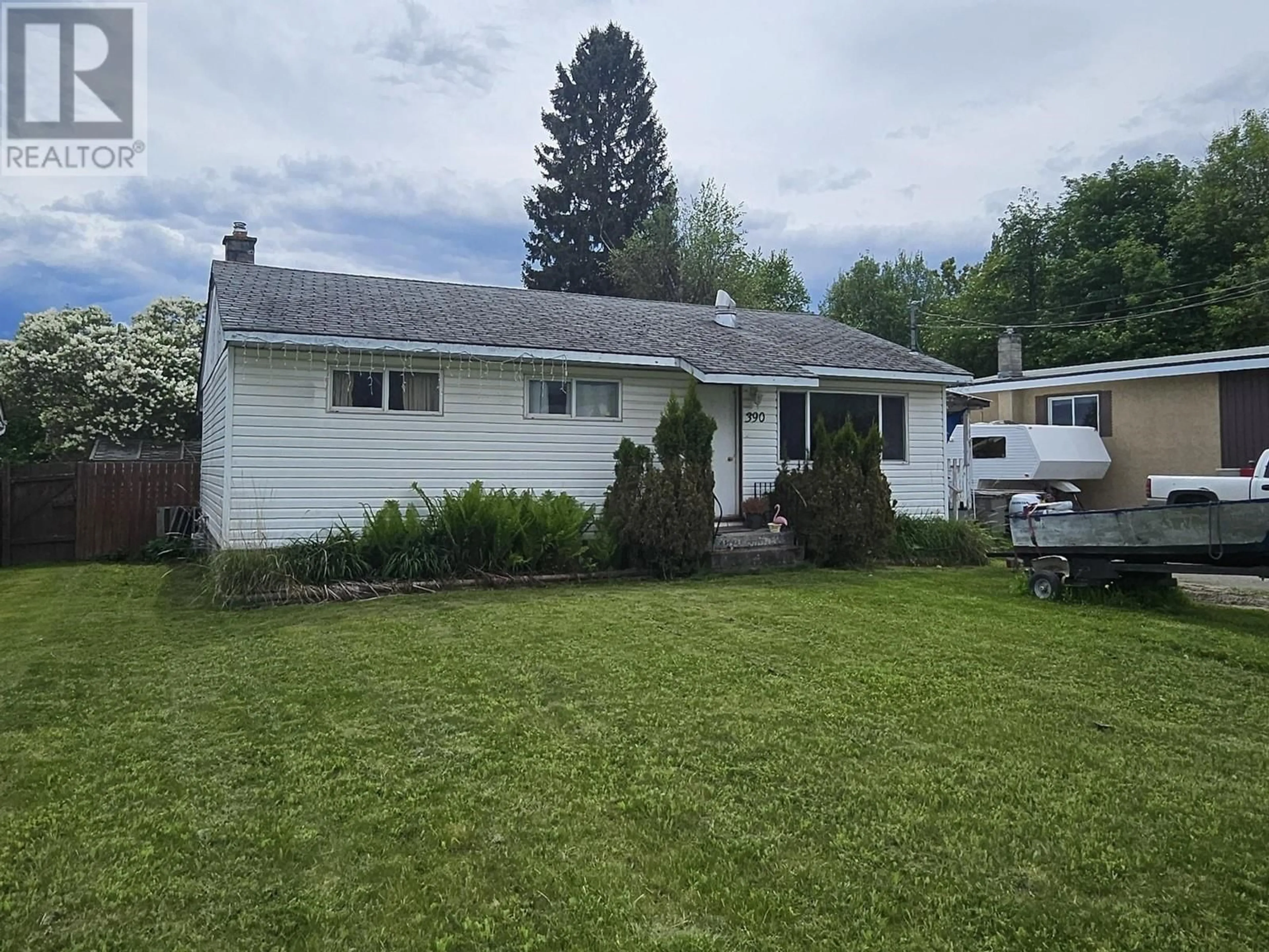 Home with vinyl exterior material, street for 390 WILKINSON STREET, Quesnel British Columbia V2J1C1