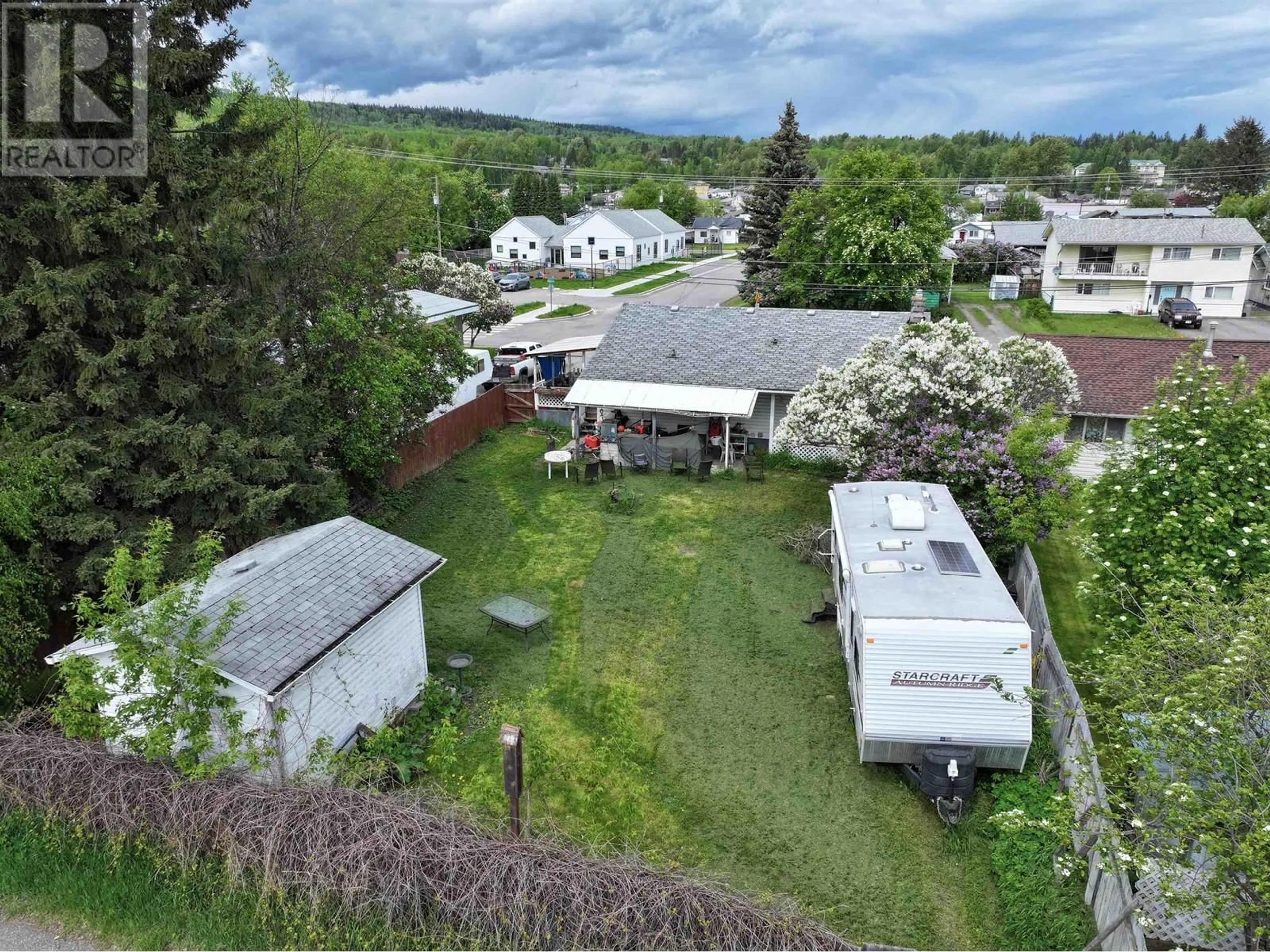 A pic from outside/outdoor area/front of a property/back of a property/a pic from drone, mountain view for 390 WILKINSON STREET, Quesnel British Columbia V2J1C1