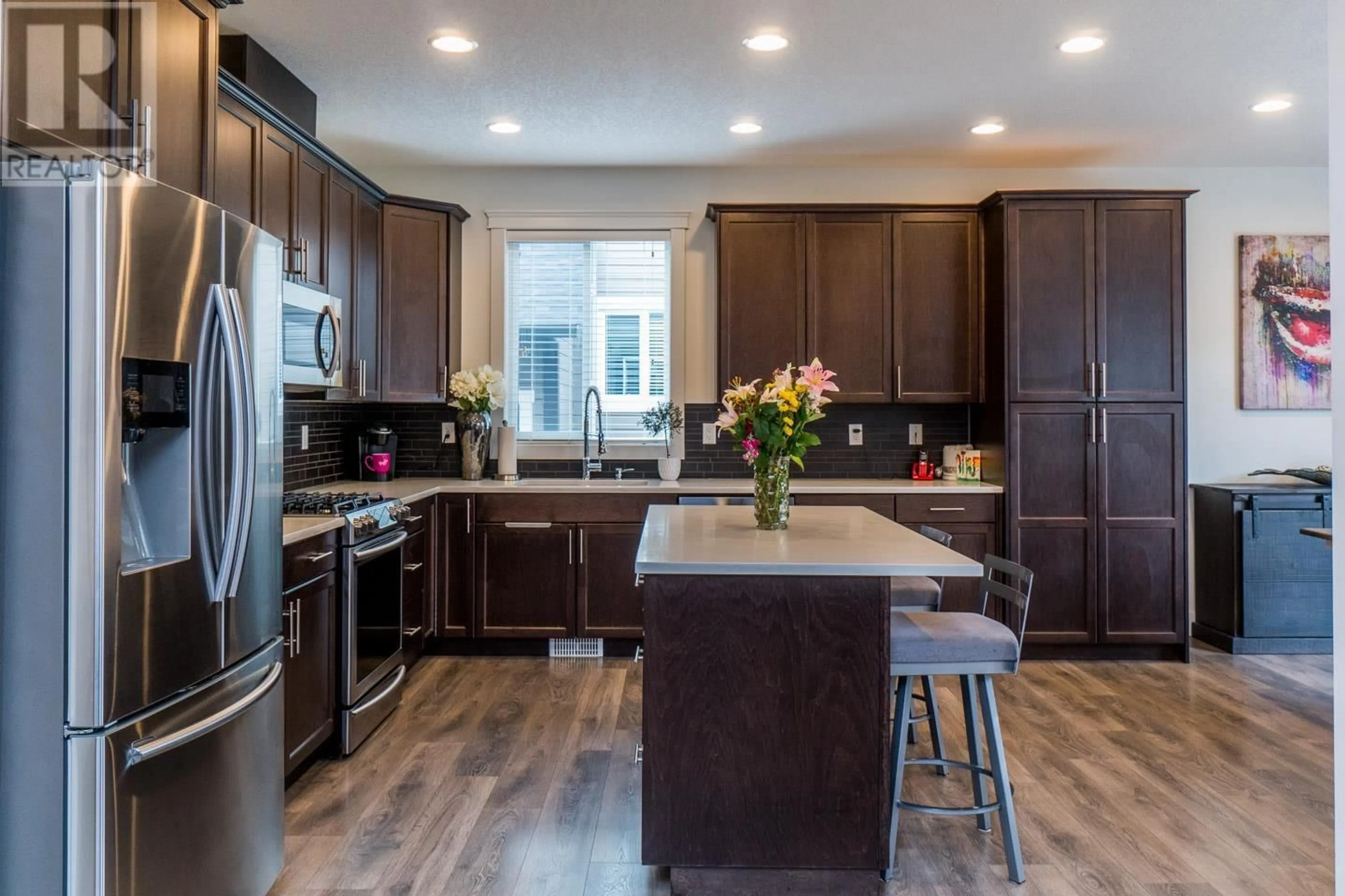 Open concept kitchen, wood/laminate floor for 3579 PARKVIEW CRESCENT, Prince George British Columbia V2N0E7