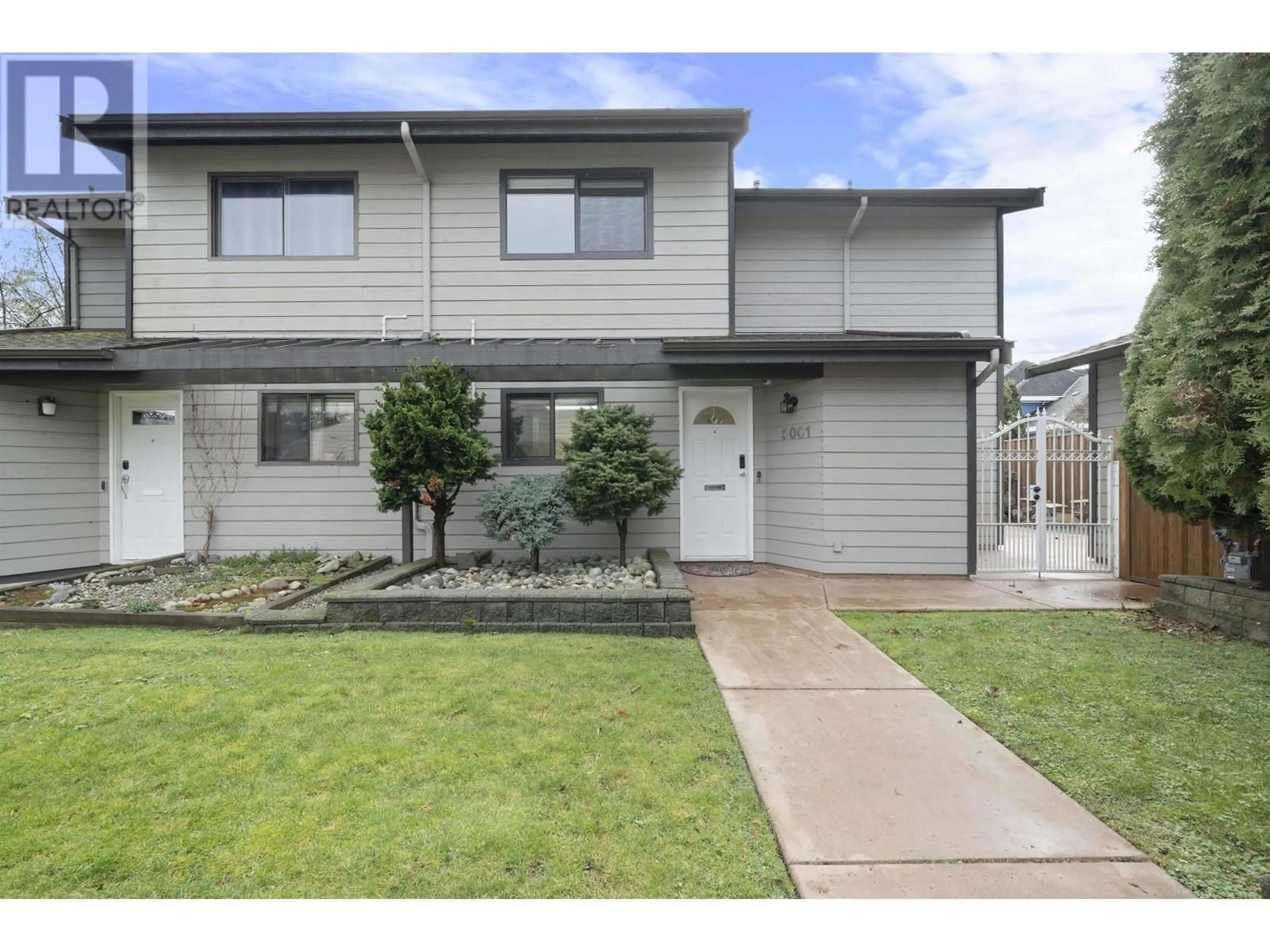 Home with vinyl exterior material, street for 5001 57 STREET, Delta British Columbia V4K3E7