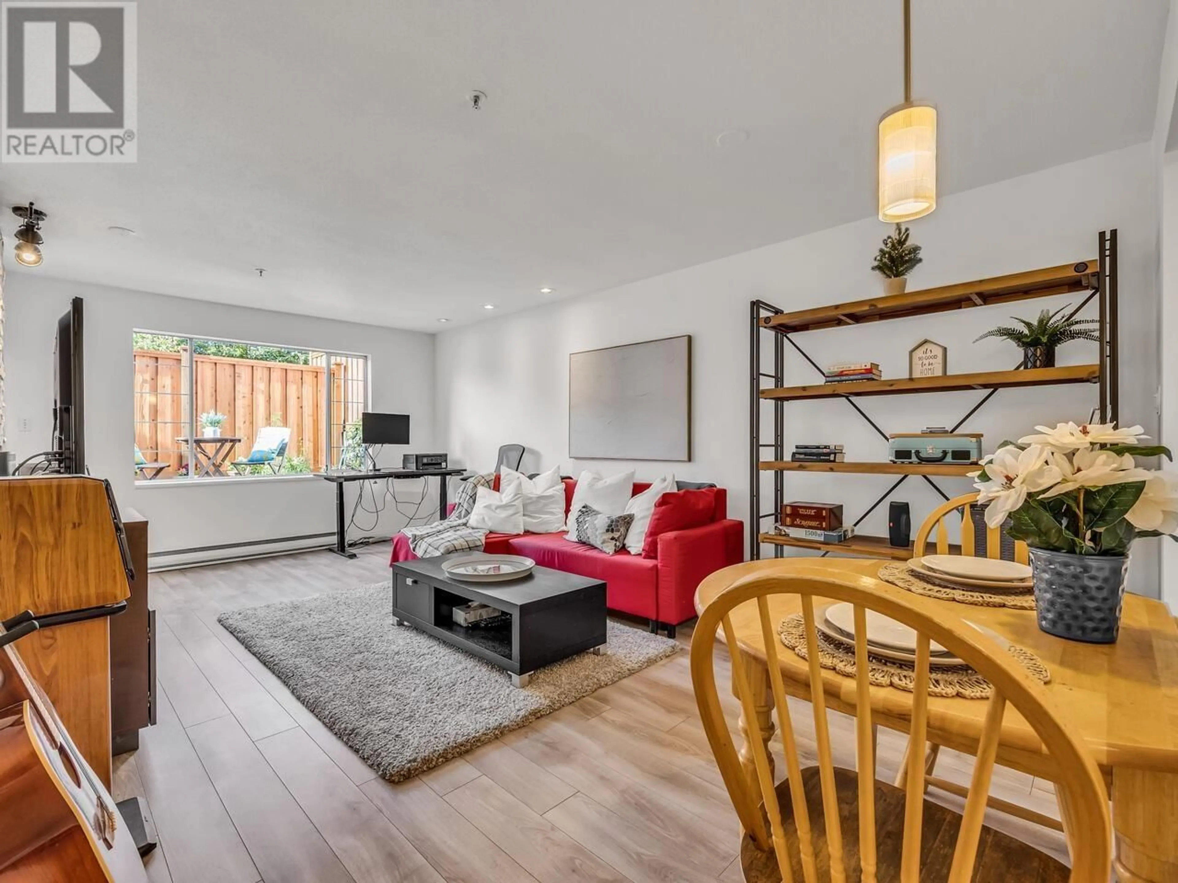 Living room with furniture, wood/laminate floor for 209 - 1433 1ST STREET, Vancouver British Columbia V5N1A4