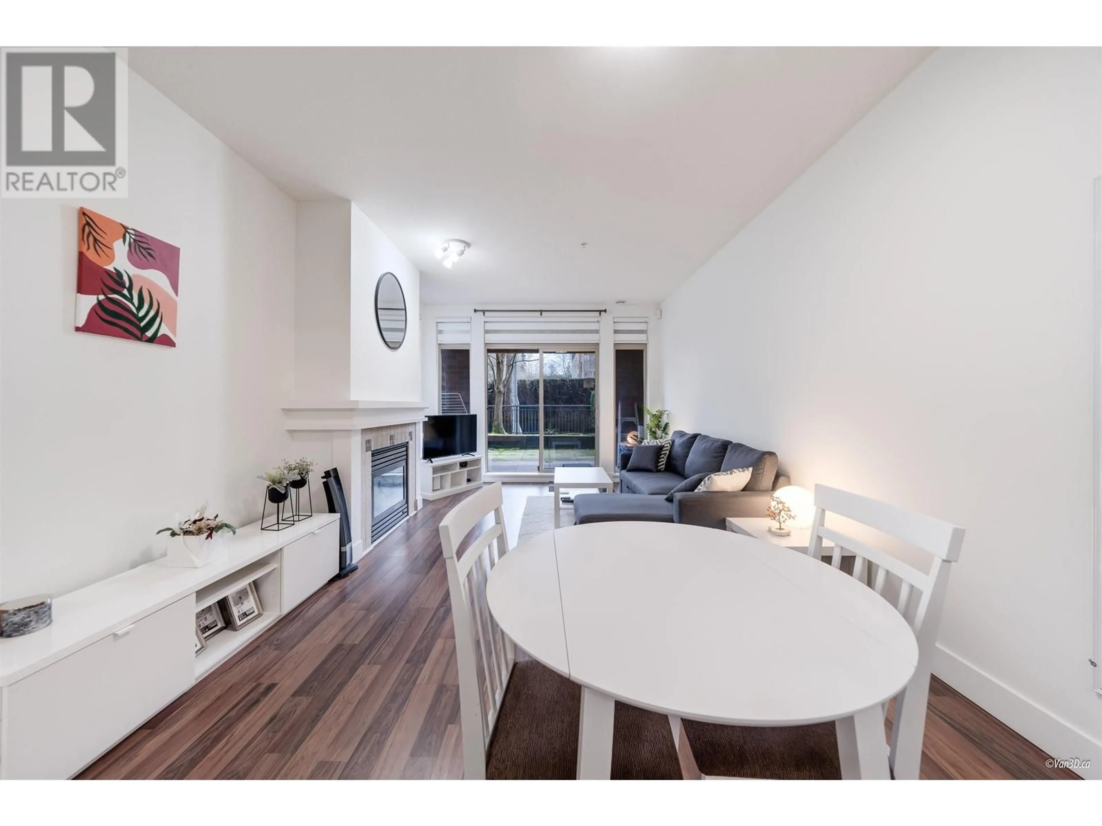 Living room with furniture, wood/laminate floor for 112 - 2280 WESBROOK MALL, Vancouver British Columbia V6T2K3