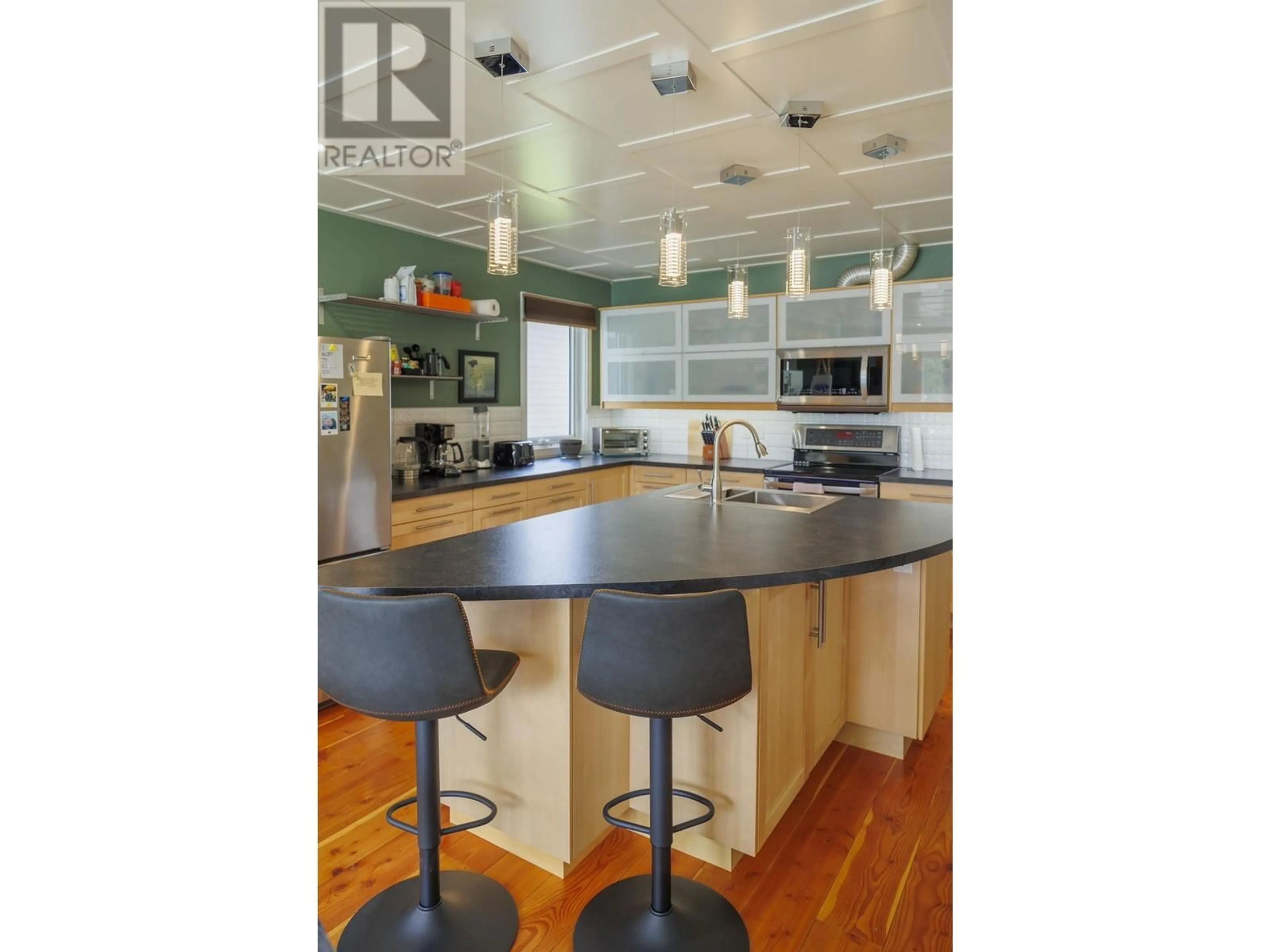 Open concept kitchen, wood/laminate floor for 1093 3RD AVENUE, McBride British Columbia V0J2E0