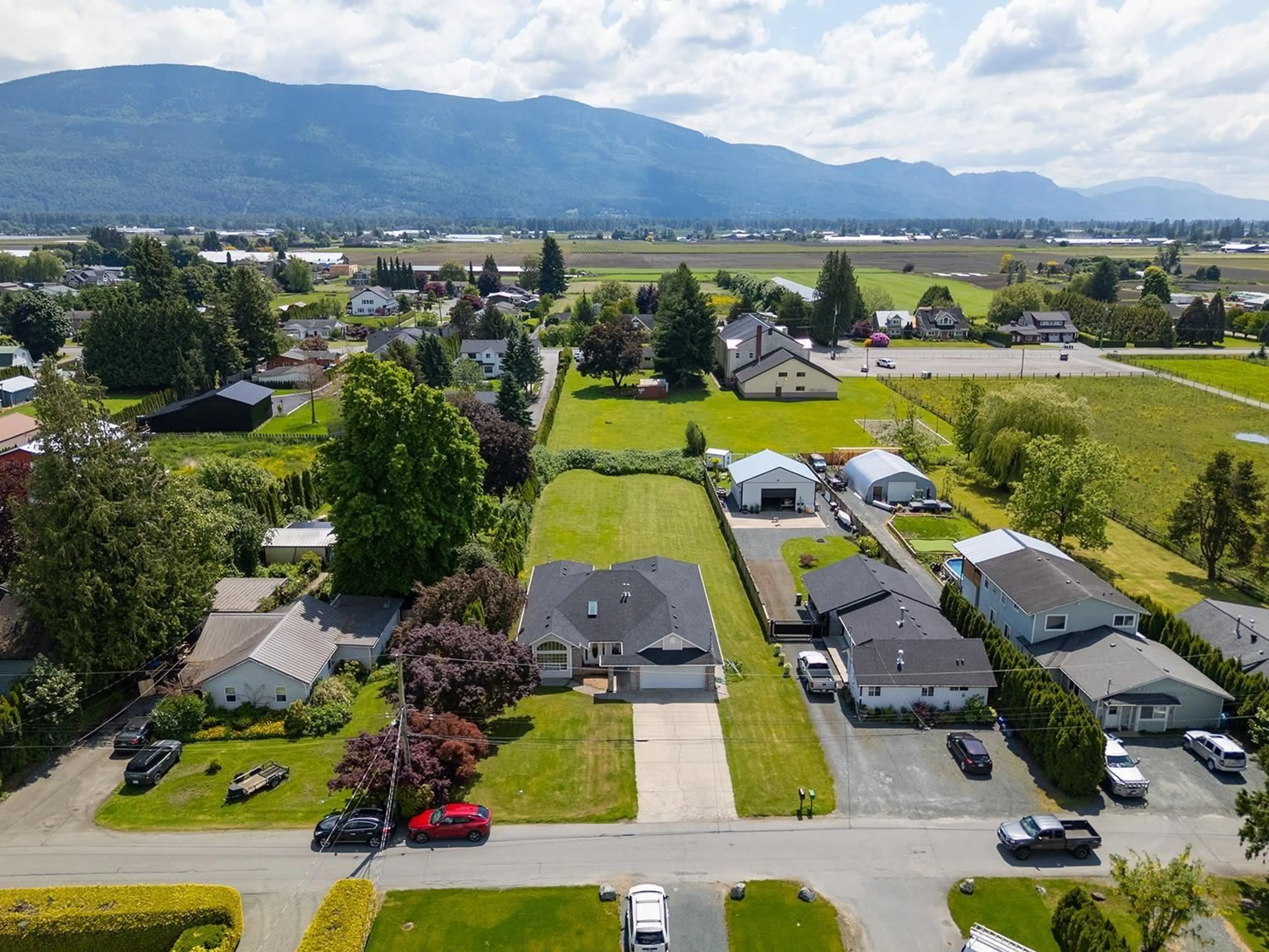 A pic from outside/outdoor area/front of a property/back of a property/a pic from drone, mountain view for 42438 PETERS ROAD, Chilliwack British Columbia V2R4K3