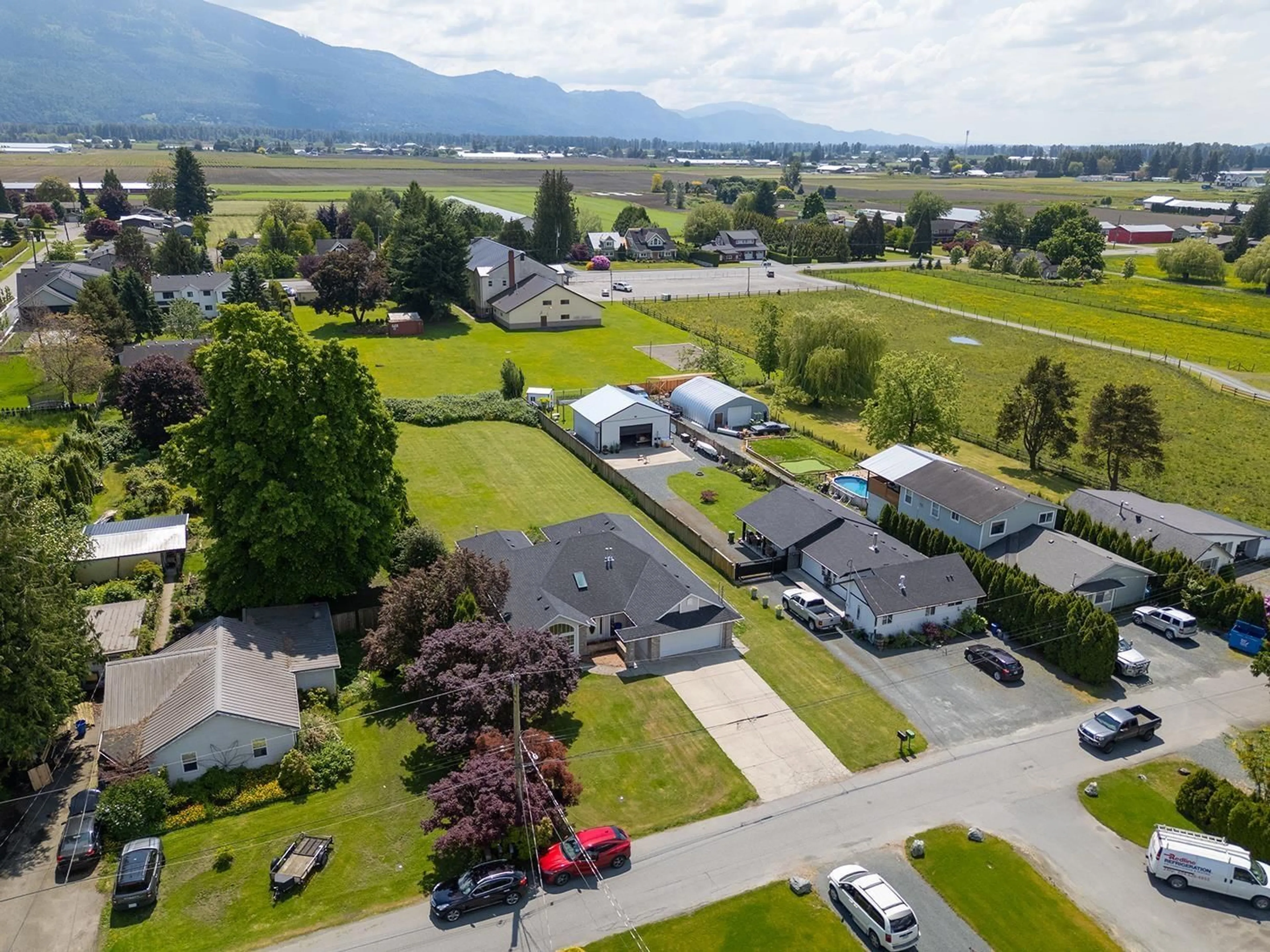 A pic from outside/outdoor area/front of a property/back of a property/a pic from drone, mountain view for 42438 PETERS ROAD, Chilliwack British Columbia V2R4K3