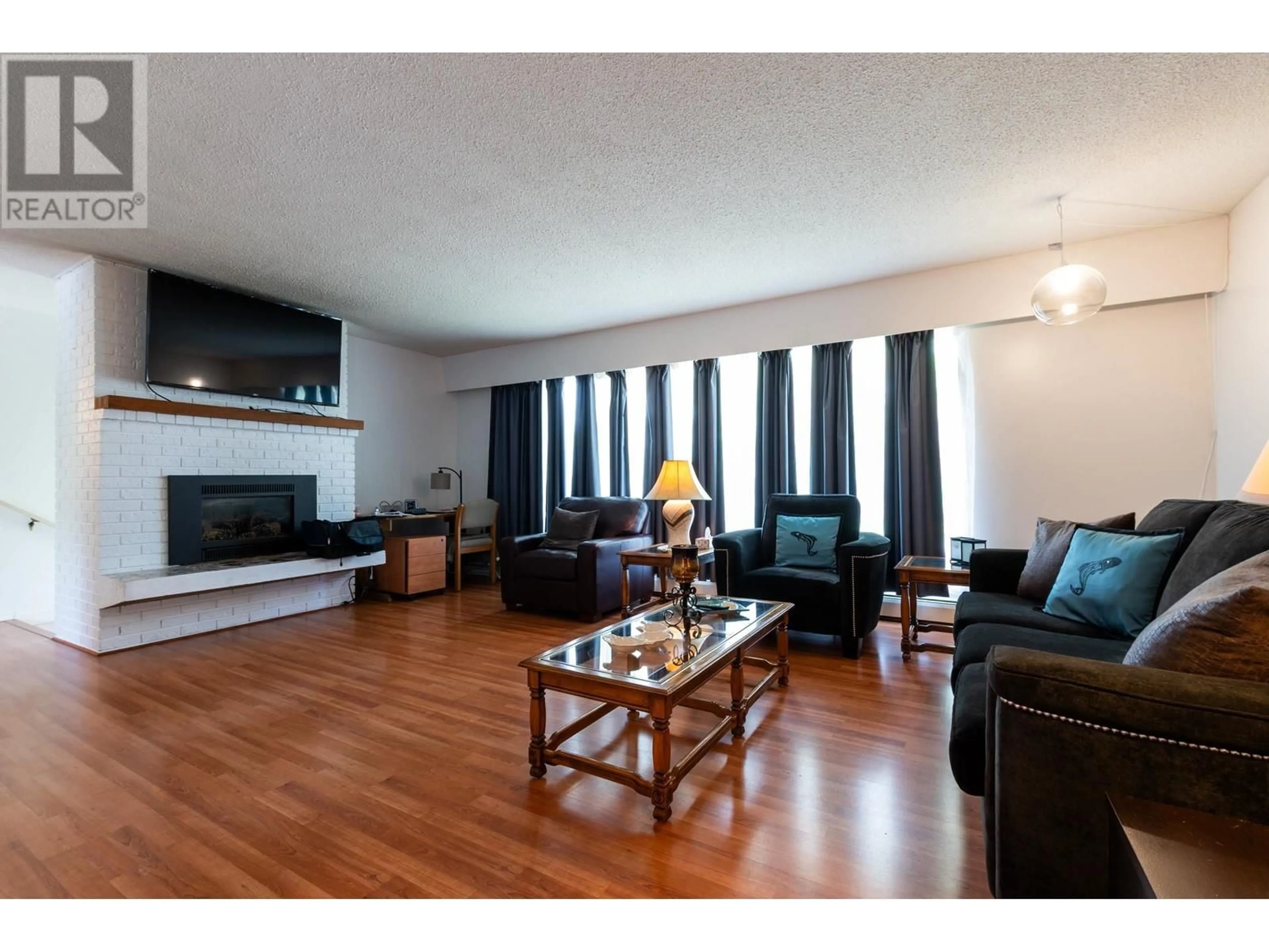 Living room with furniture, wood/laminate floor for 1502 ASH STREET, Prince George British Columbia V2L5J7