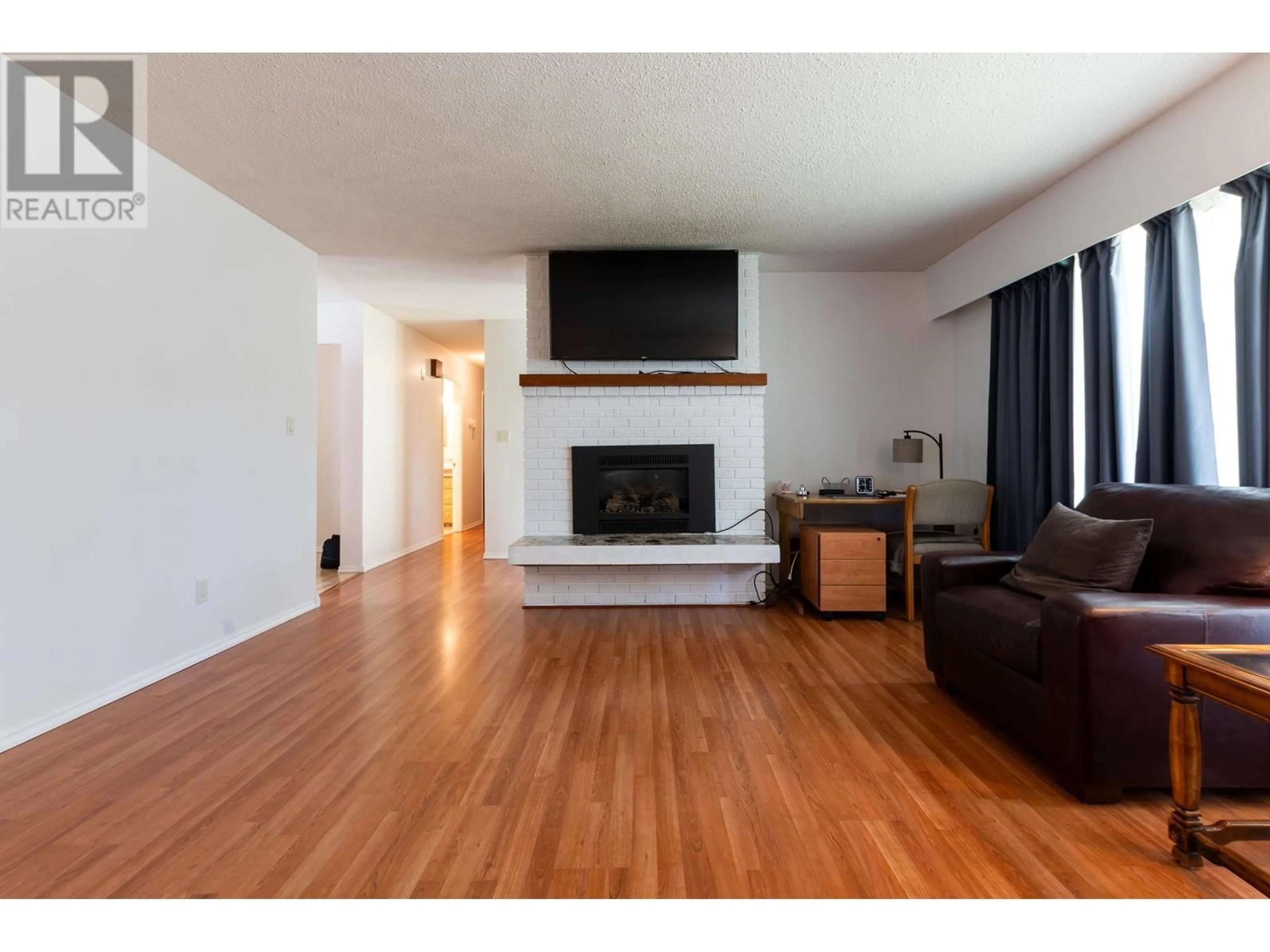 Living room with furniture, wood/laminate floor for 1502 ASH STREET, Prince George British Columbia V2L5J7
