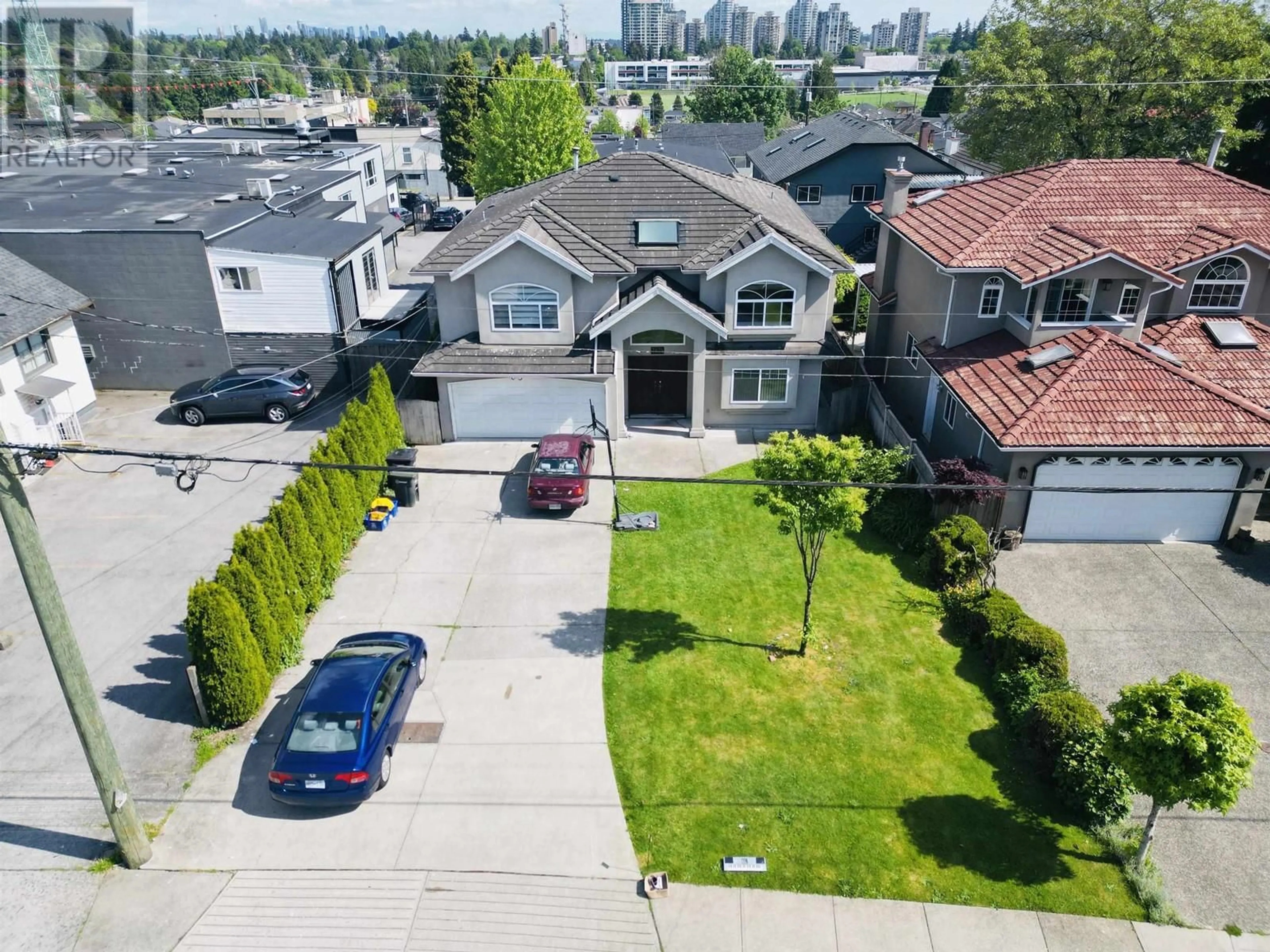 A pic from outside/outdoor area/front of a property/back of a property/a pic from drone, street for 7874 14TH AVENUE, Burnaby British Columbia V3N2B2
