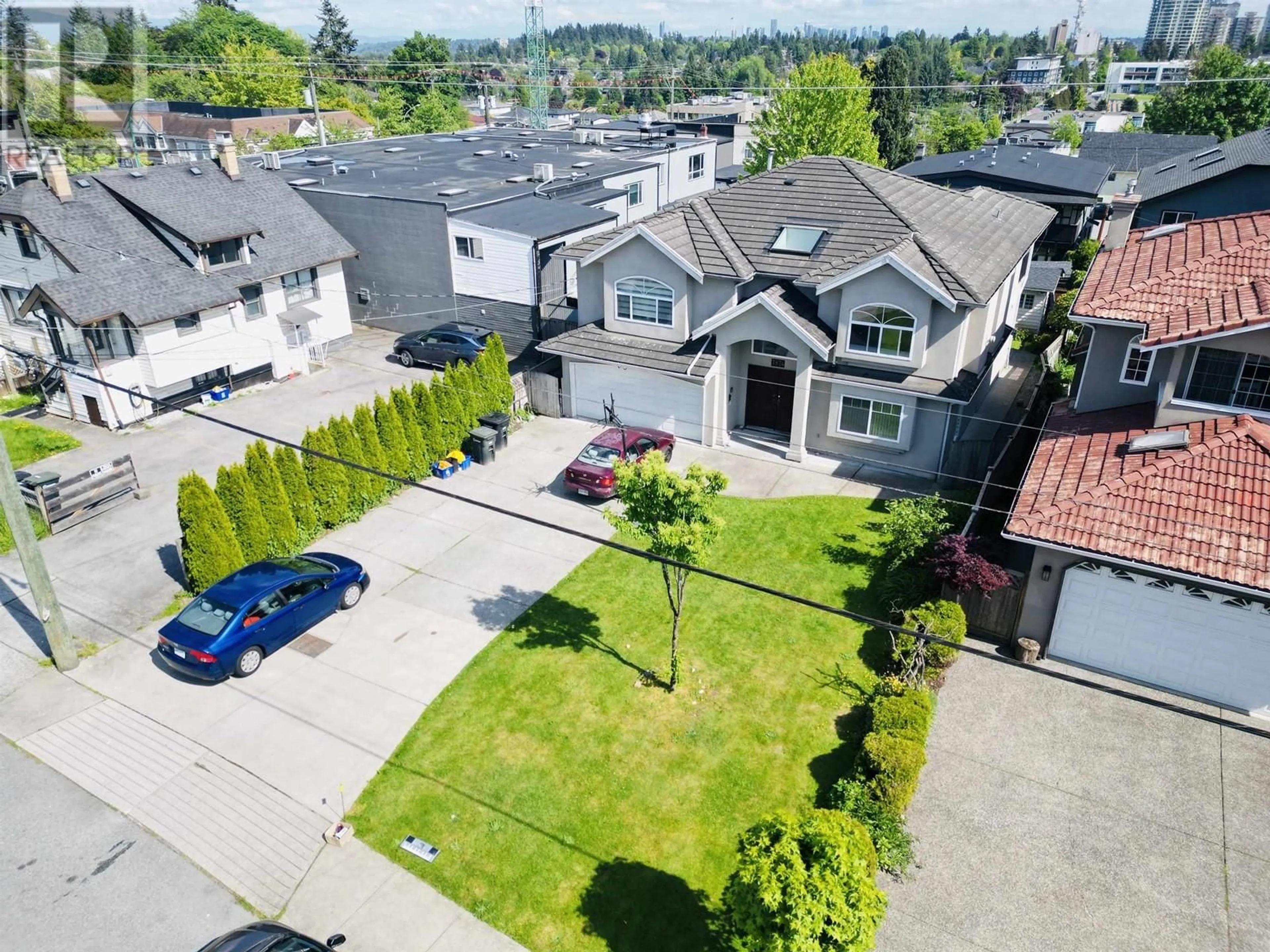 A pic from outside/outdoor area/front of a property/back of a property/a pic from drone, street for 7874 14TH AVENUE, Burnaby British Columbia V3N2B2