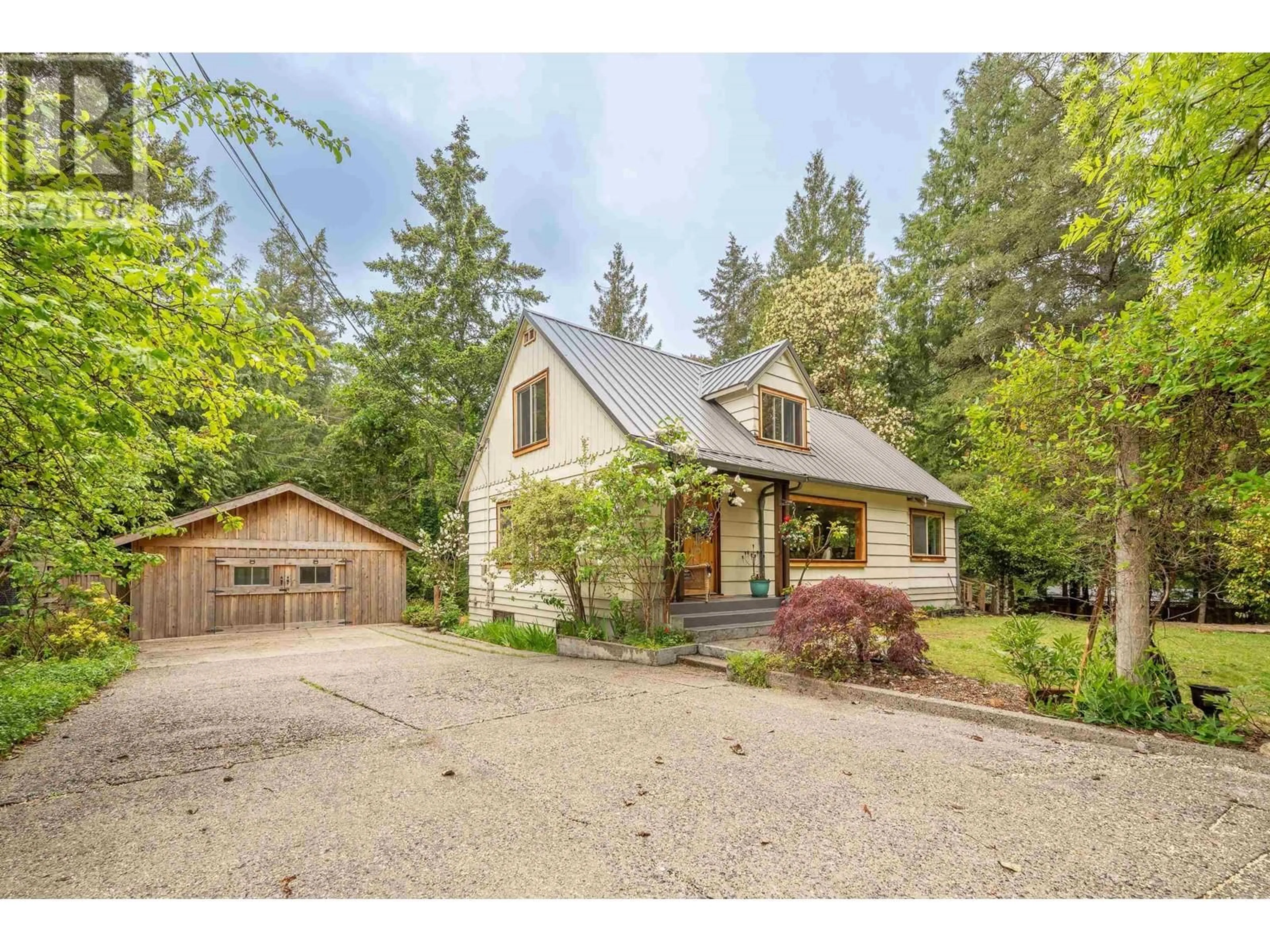 A pic from outside/outdoor area/front of a property/back of a property/a pic from drone, street for 6141 STOCKWELL ROAD, Sechelt British Columbia V7Z0L3