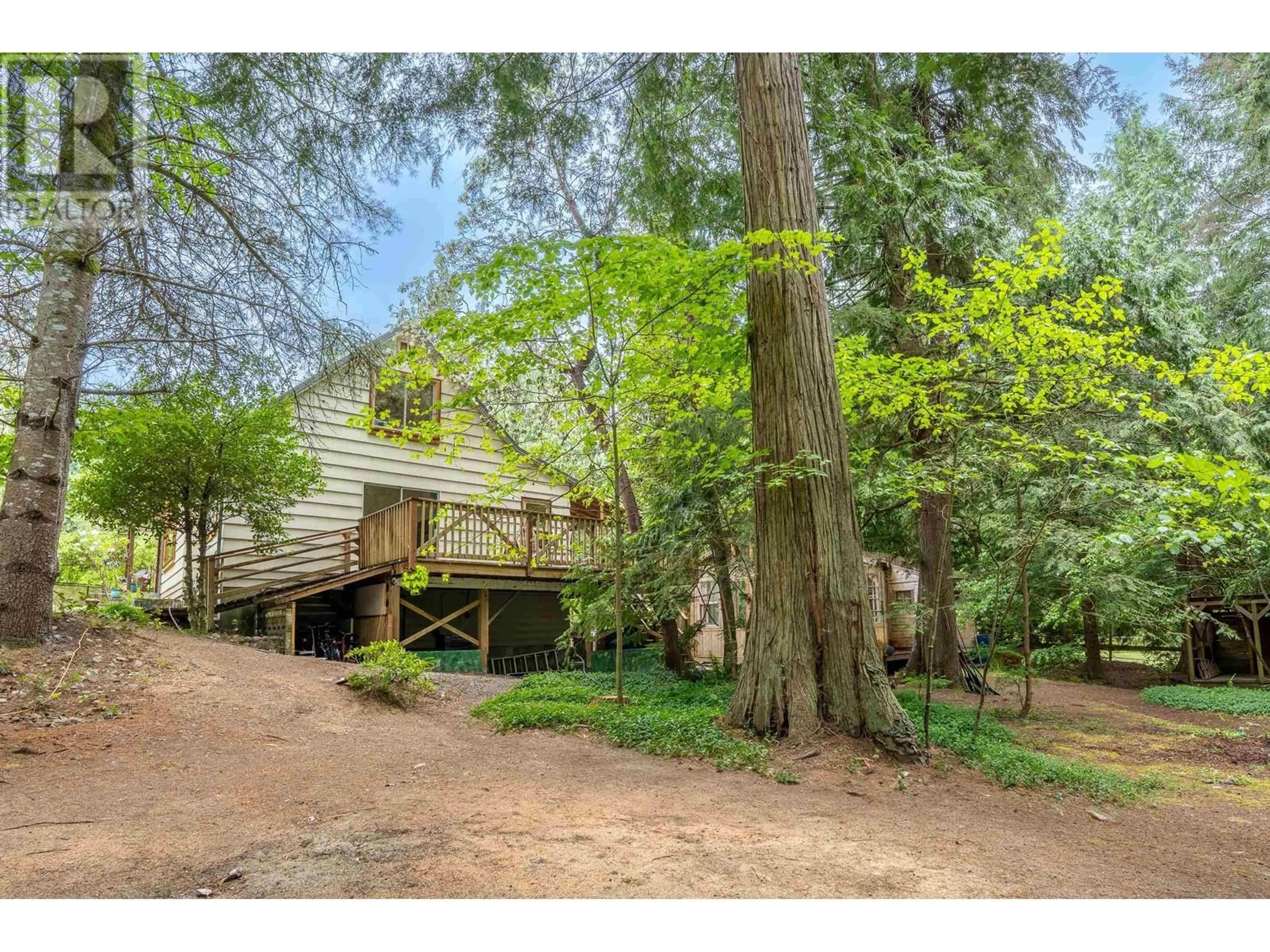 A pic from outside/outdoor area/front of a property/back of a property/a pic from drone, forest/trees view for 6141 STOCKWELL ROAD, Sechelt British Columbia V7Z0L3